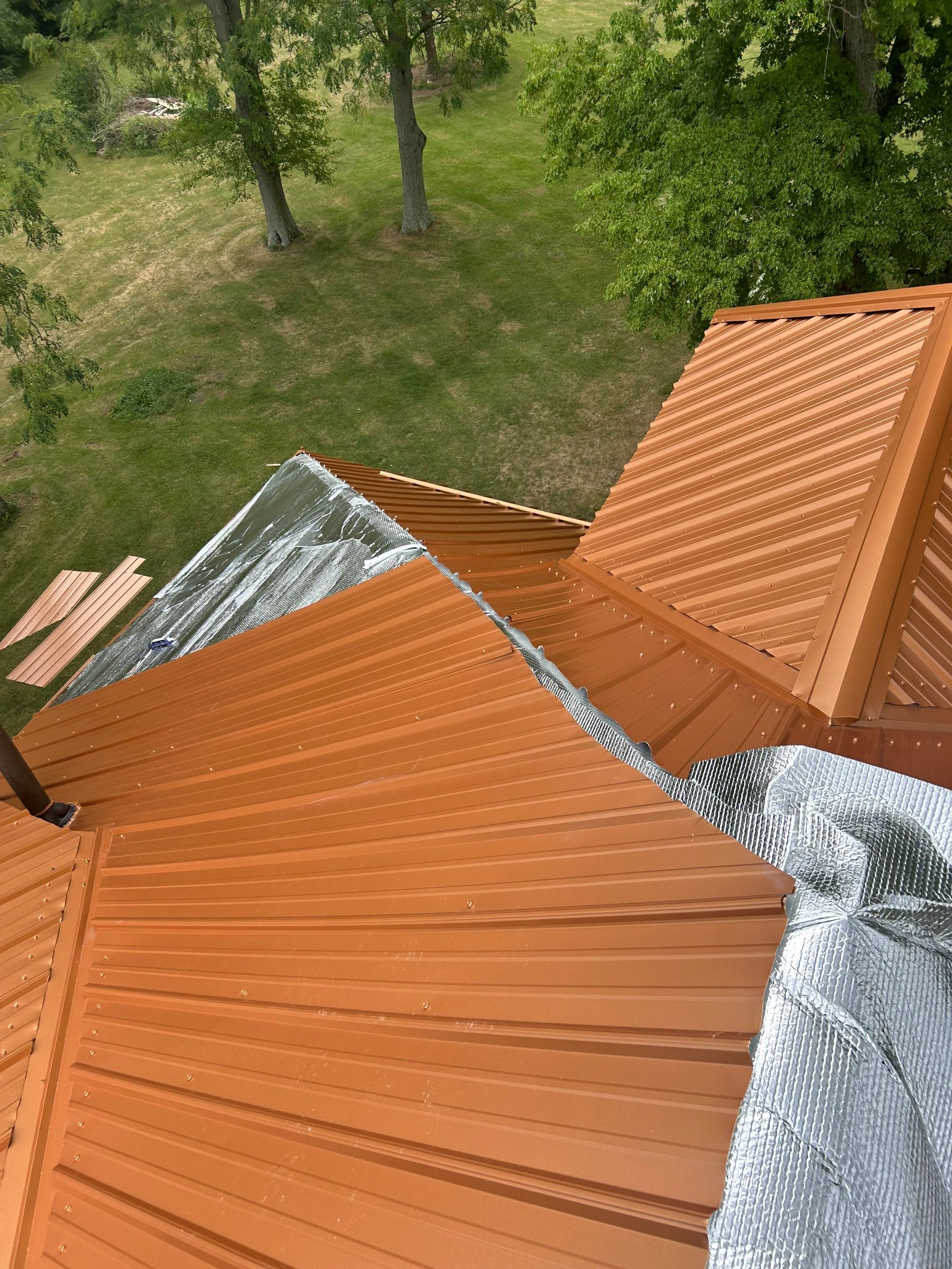 Residential Roofing Installation using Performance Panel Metal - Copper Metallic by RoofX 