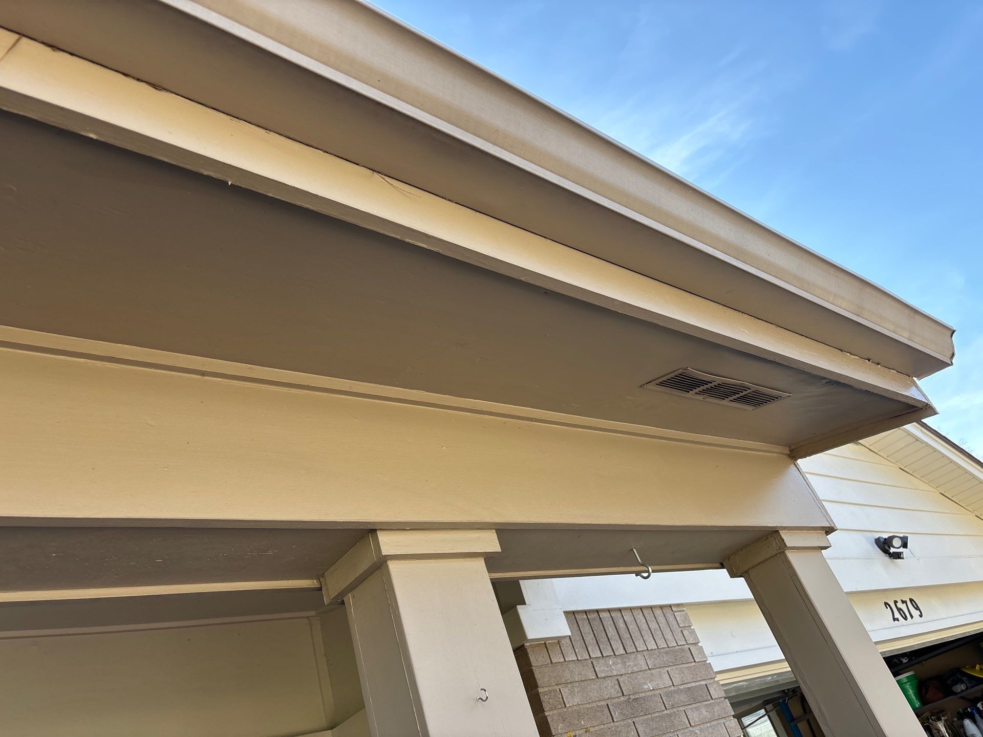 Installing new Roof, Fascia, Soffit, and Gutters. New custom trim around garage door. by Acme Exteriors