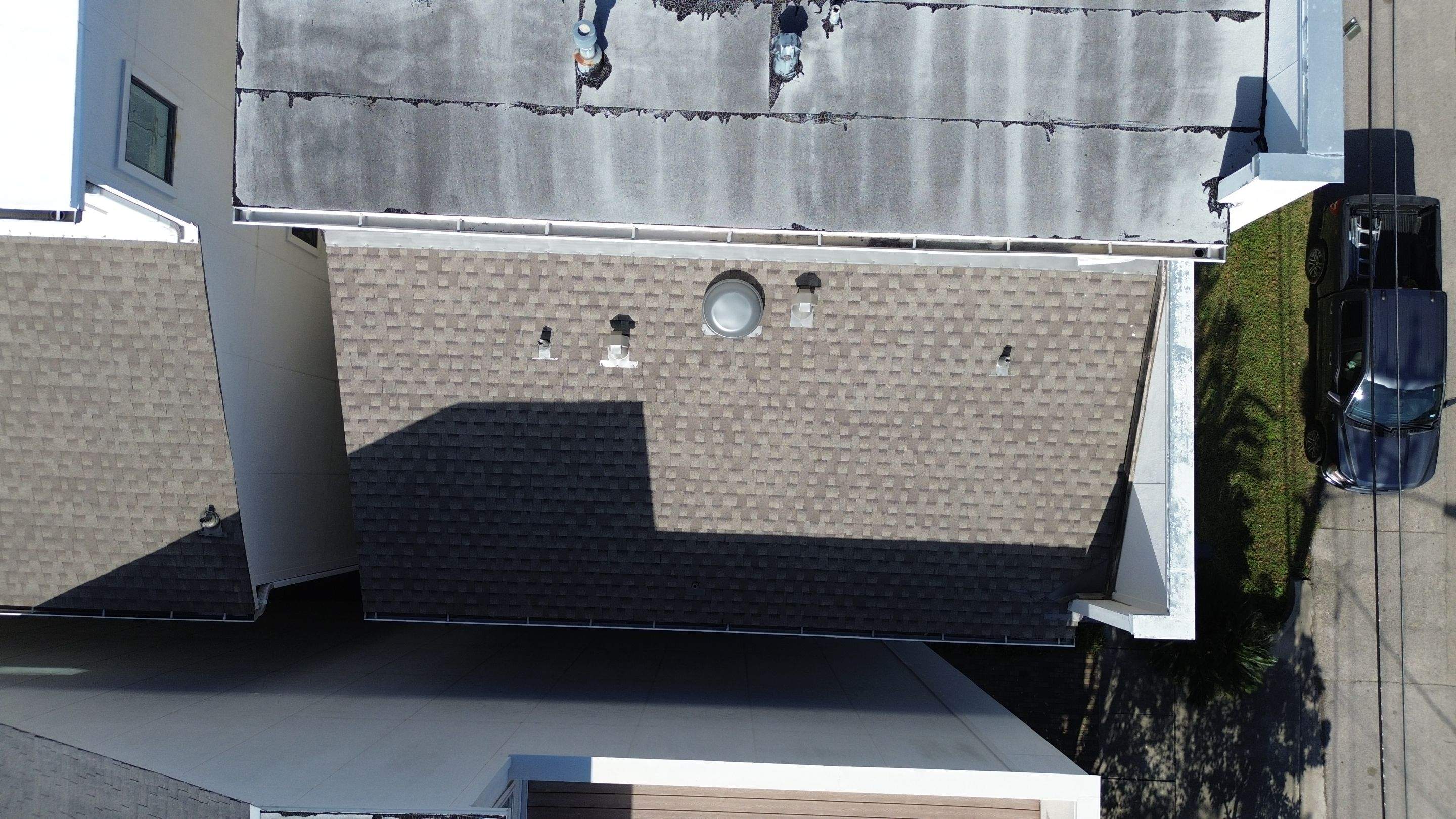 Four Story Townhome Roof Replacement by Houston Roofing & Construction