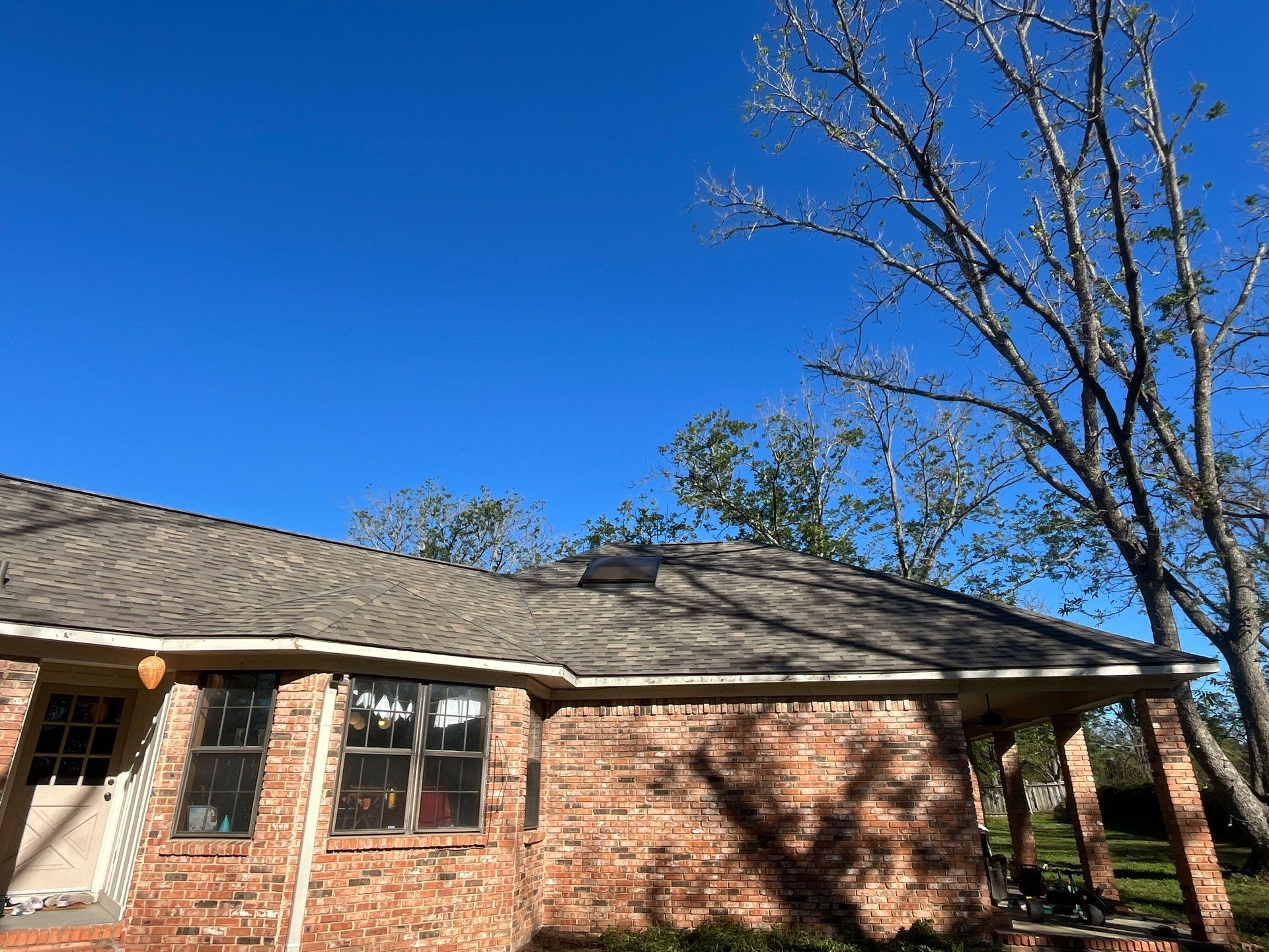 Malarkey WWP-Reddish Brown Brick  by Tejas Roofworks + Restoration