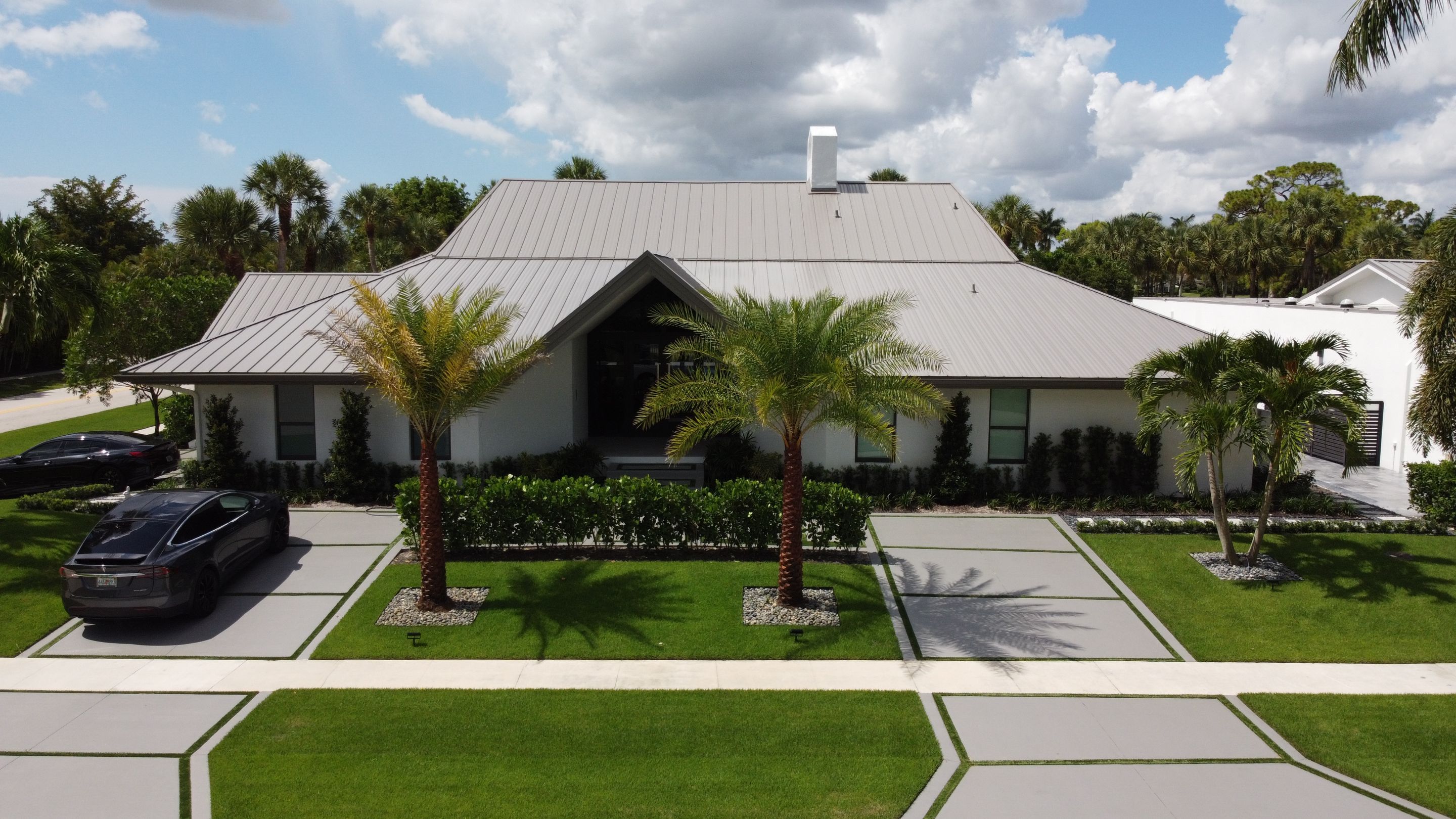 Residential Roofing Installation using 1" Nail strip metal roof by BLUES BROTHERS CONSTRUCTION CORP