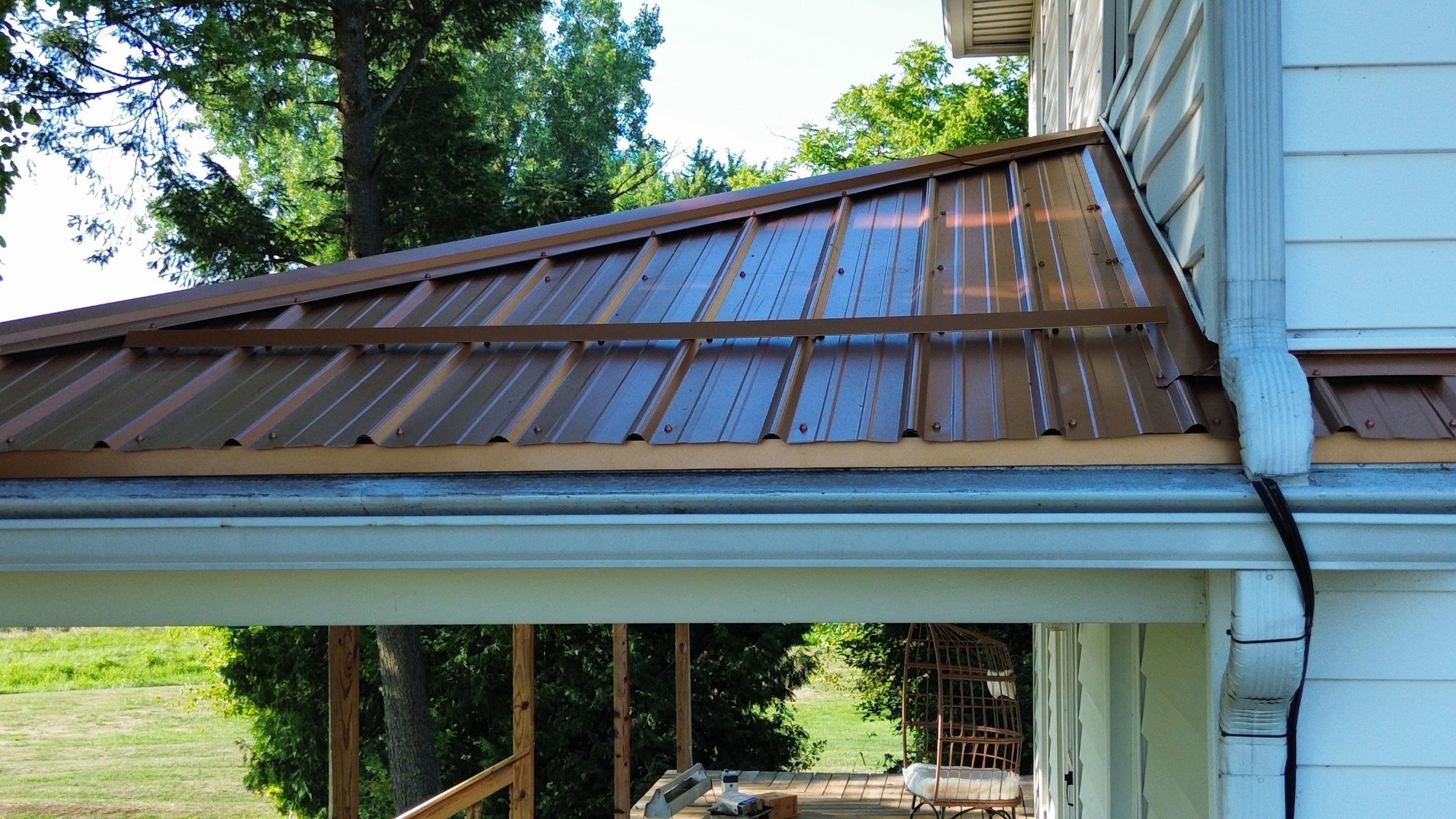 Residential Roofing Installation using Performance Panel Metal - Copper Metallic by RoofX 