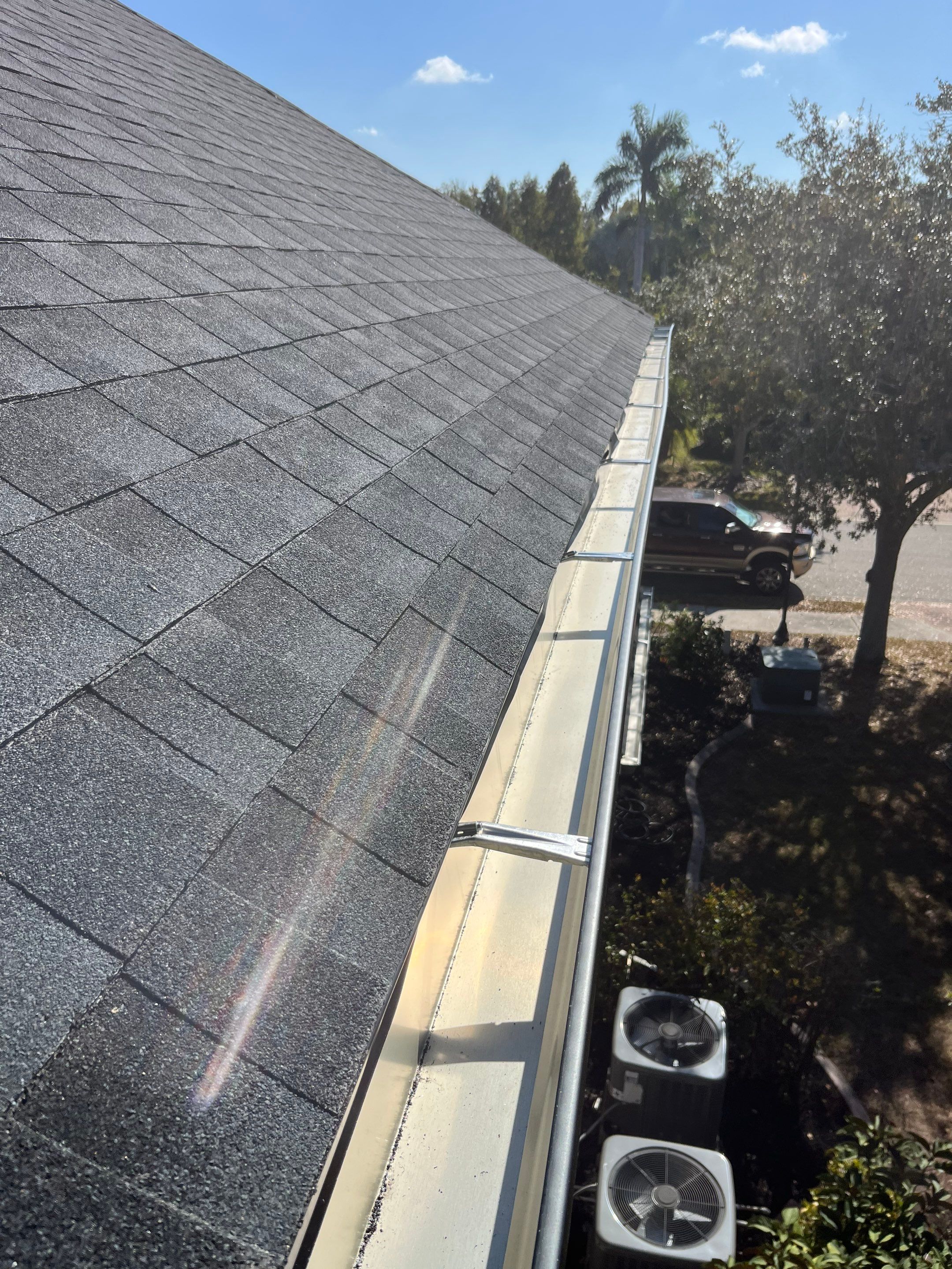 Black 6-inch Seamless Gutters for Modern Ellenton Homes FL by Gutter Professors