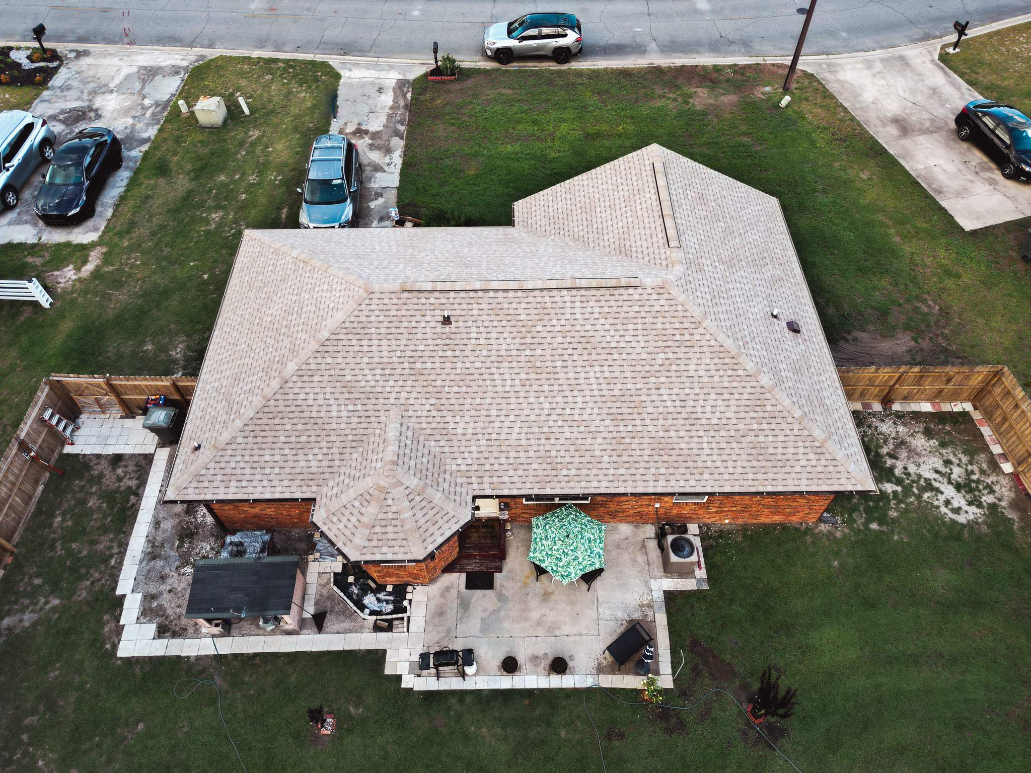 Residential Roofing Installation using Atlas Pinnacle Pristine Tan Mist by Talya Roofing