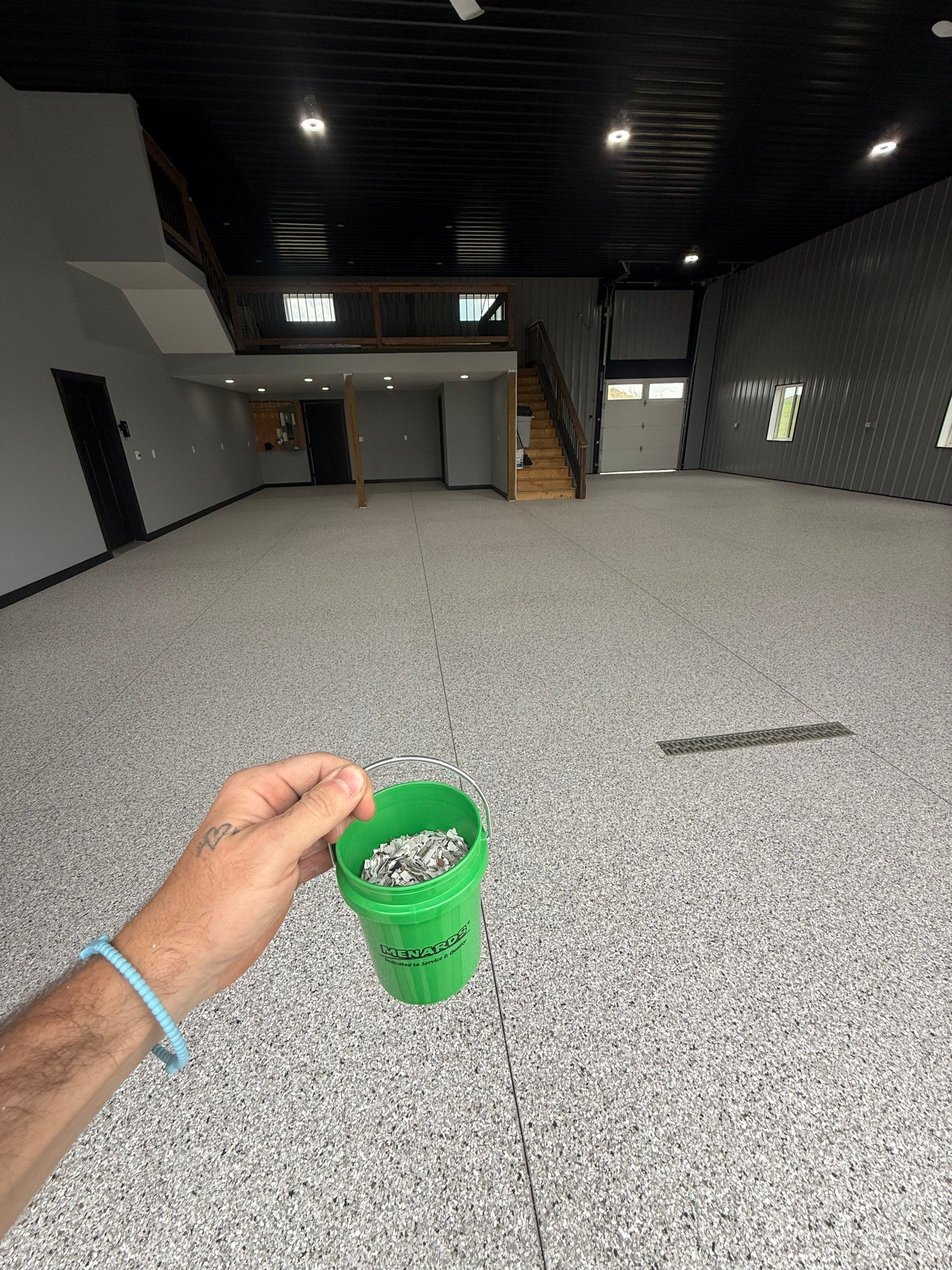 Polyaspartic Garage Floor Coating with Decorative Flake in Wentworth by Select Painting, Coatings & Garage Cabinets