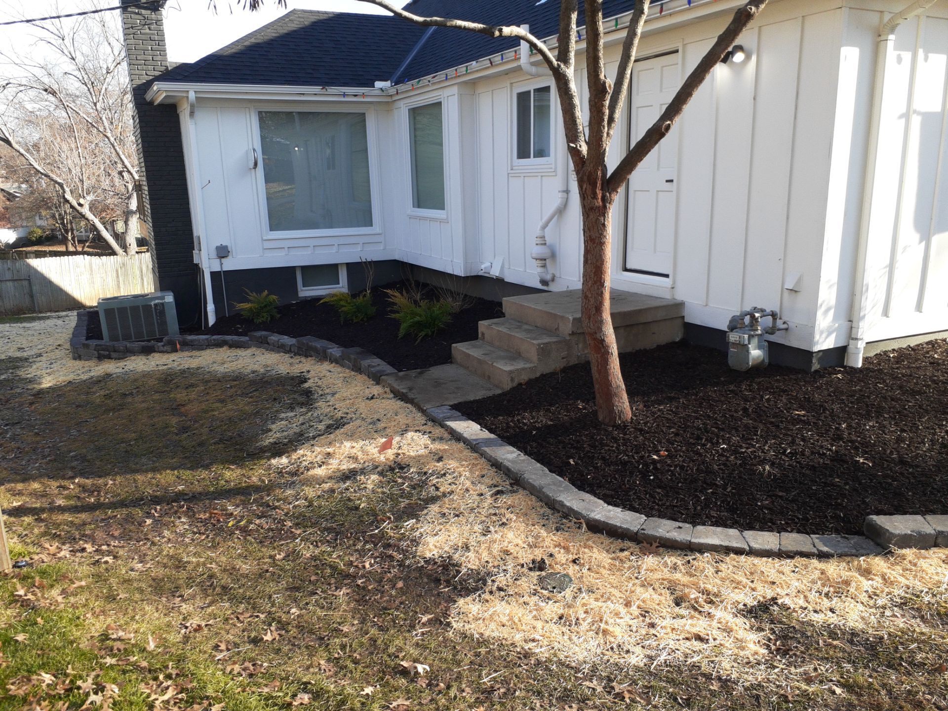 Entire Home Landscape and Retaining Walls by LAND ESCAPES LLC