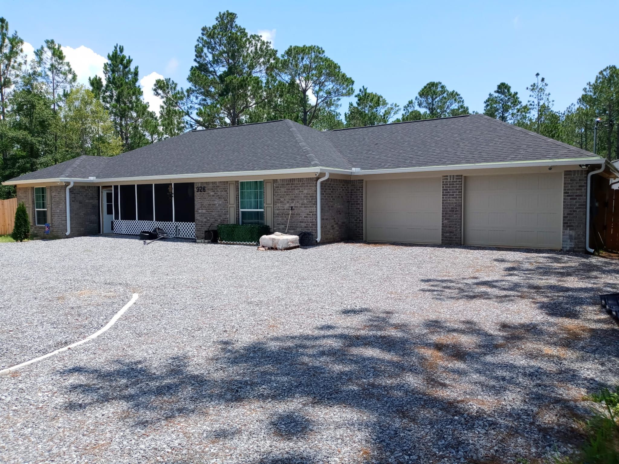 Downspout Installation using White Down Spouts in Milton FL by Gutter Professors