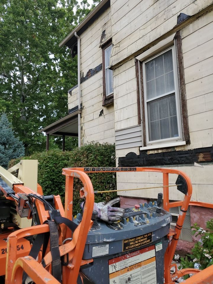 Fire damaged home in Tremont by Absolute Roofing and Construction
