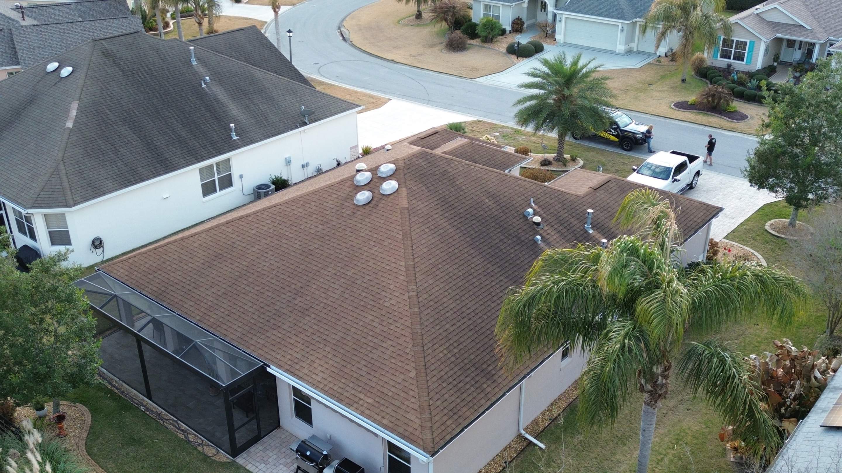 Before and after drone pictures in The Villages FL by Gold Key Roofing