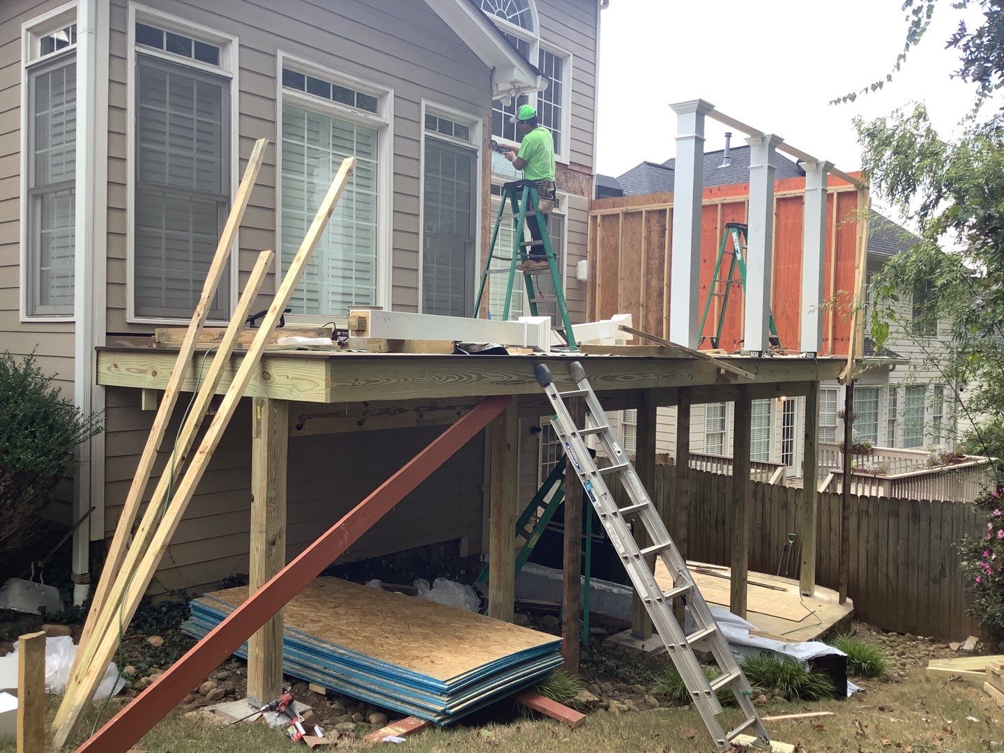 Smyrna Composite Deck and Covered Porch Renovation by Swift Home Renovations