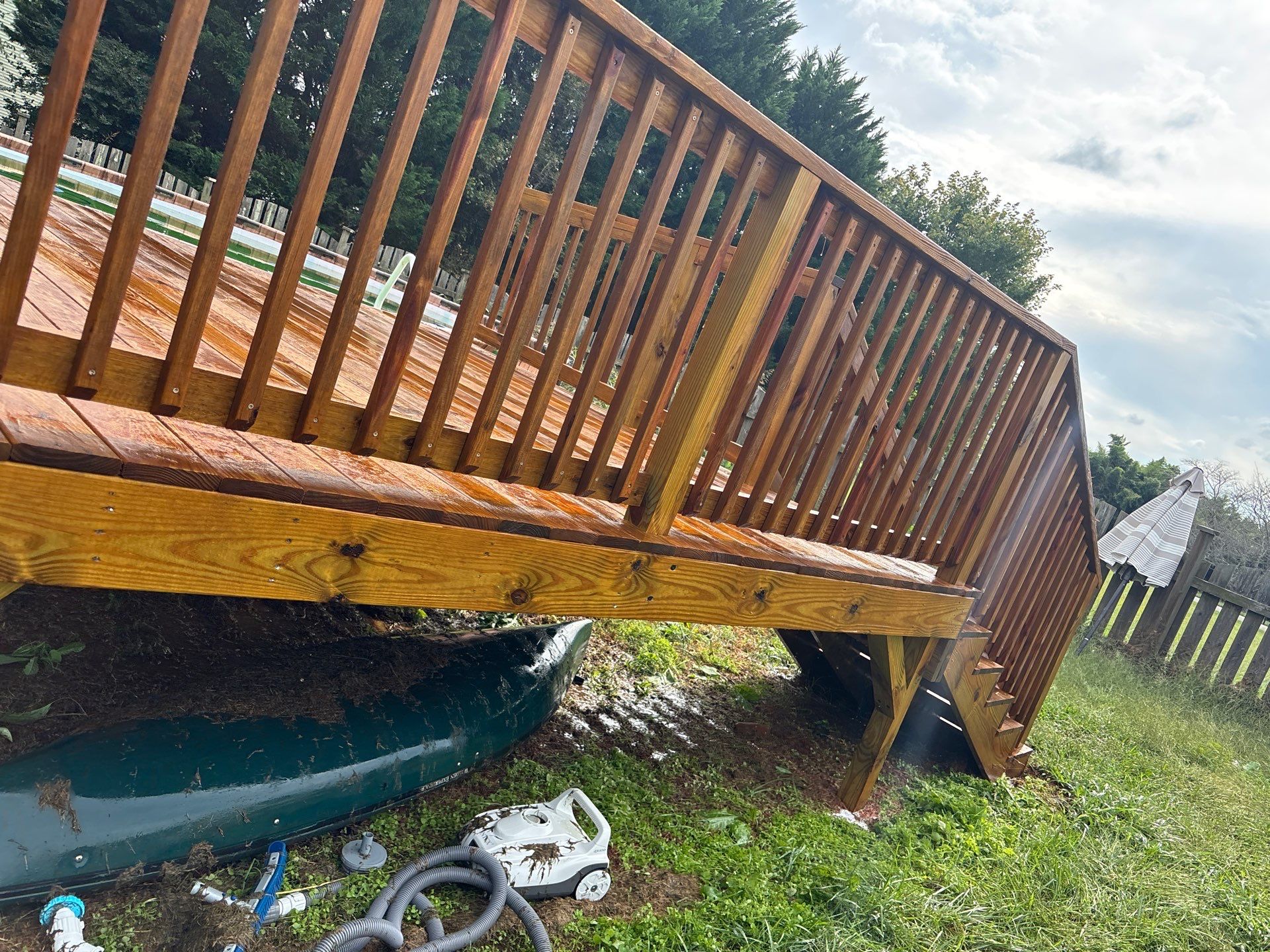 Concrete Walk Way and Wood Deck using Wood and Concrete Sealant by DuraSeal