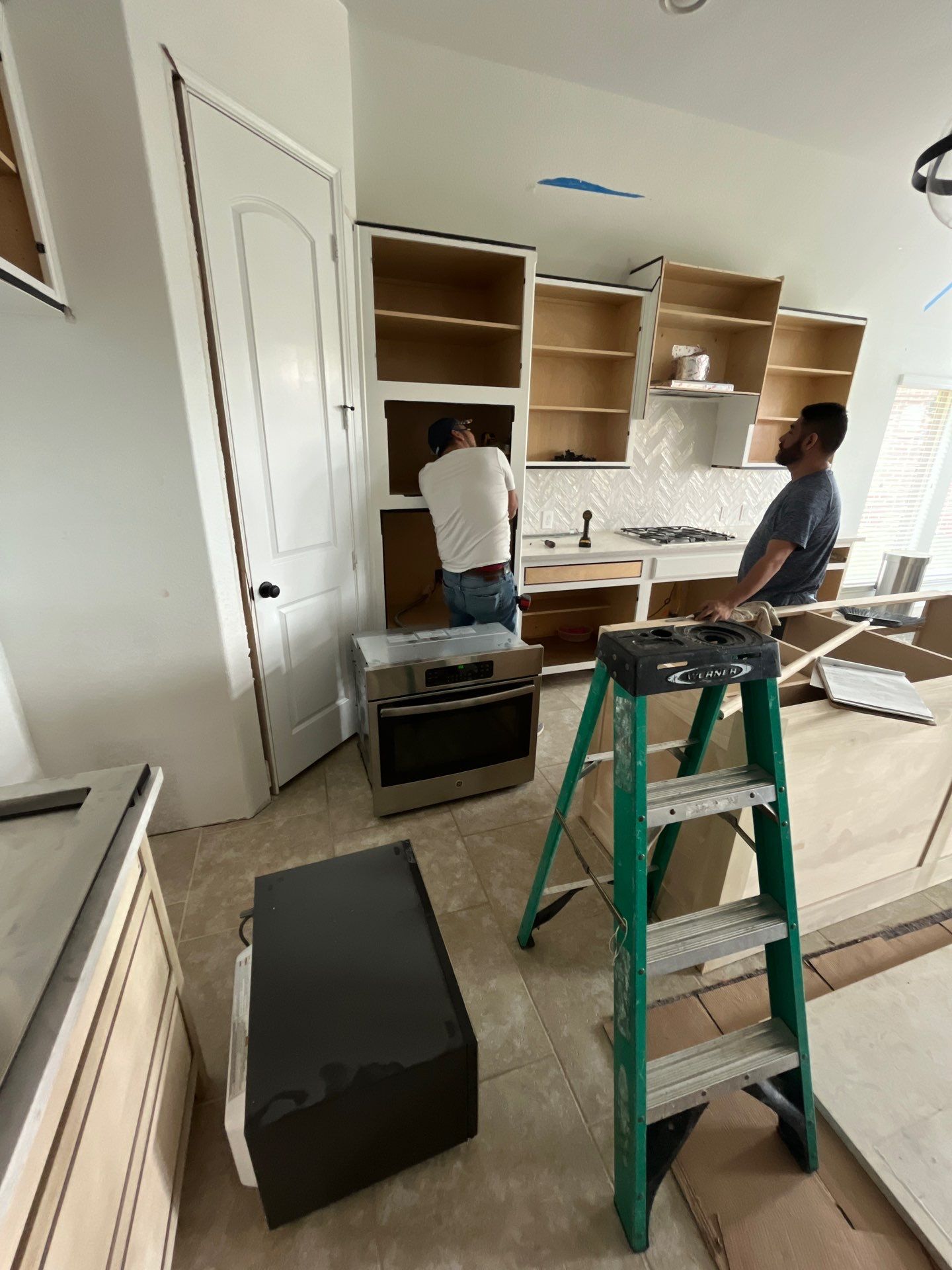 Kitchen Remodel using Water mitigation equipment by L&T General Contractors and Restoration INC