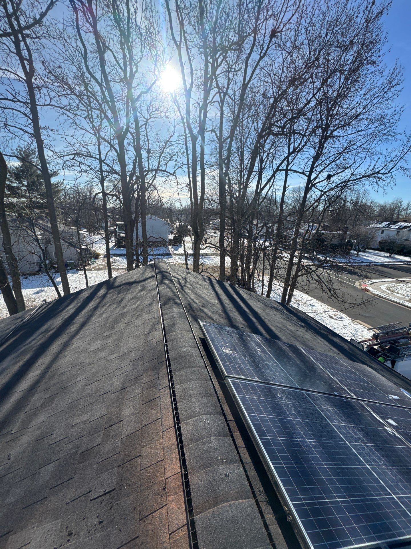 Onyx Black Shingles by Reimagine Roofing
