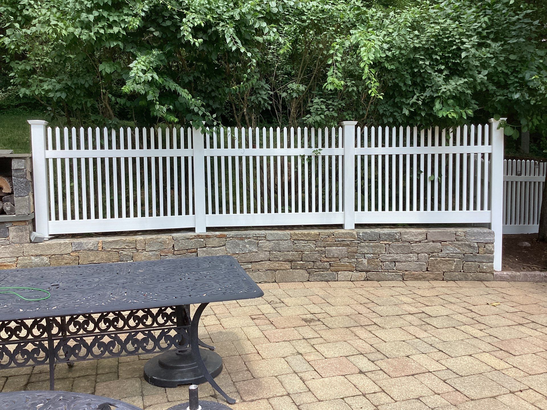 Replacement White Vinyl picket fence and matching gates by DiGiorgi Roofing and Siding Inc