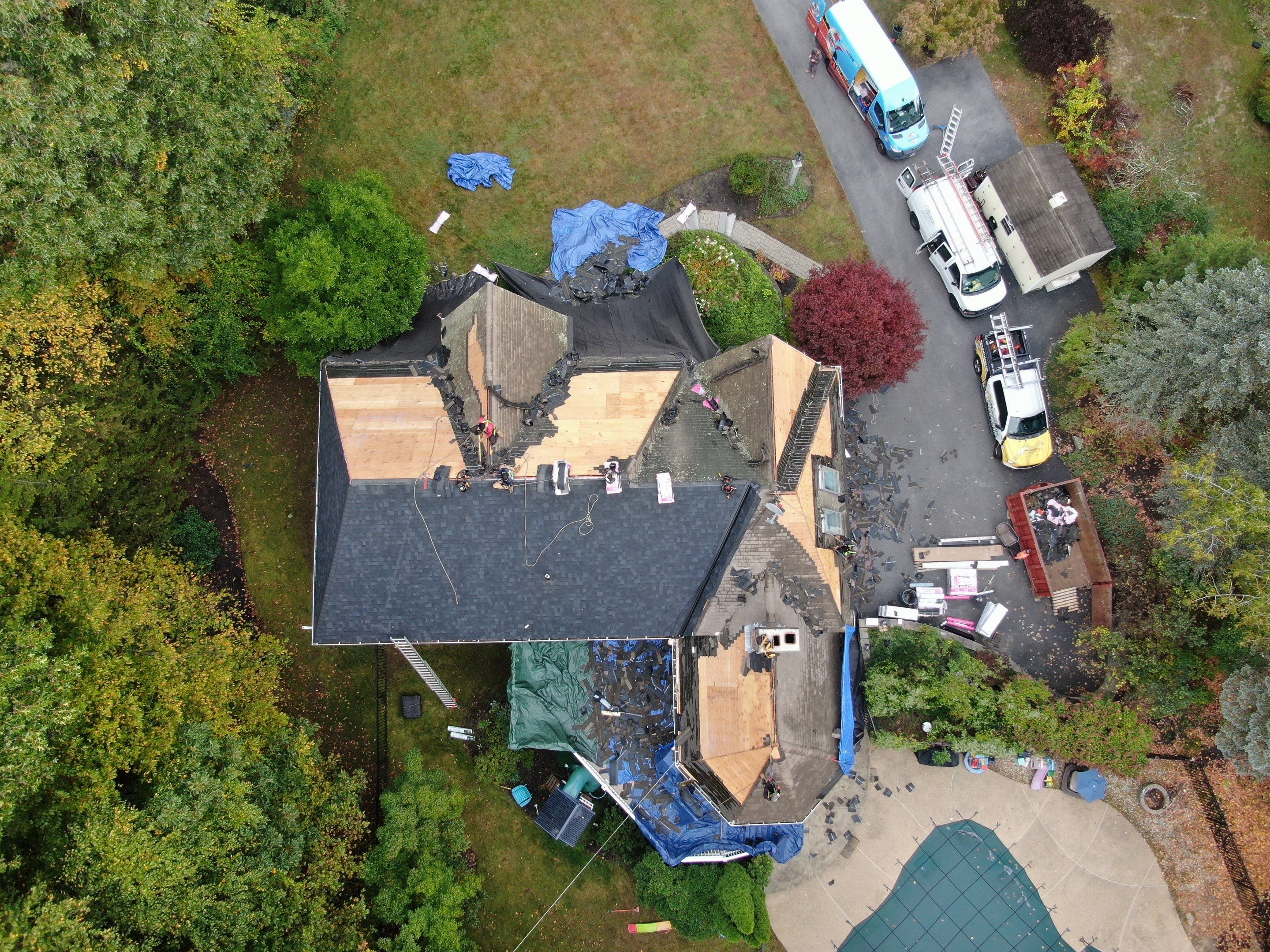 New Roof, Skylights, and Metal Accent Roof Installation in Groton by Mighty Dog Roofing of Greater Middlesex County