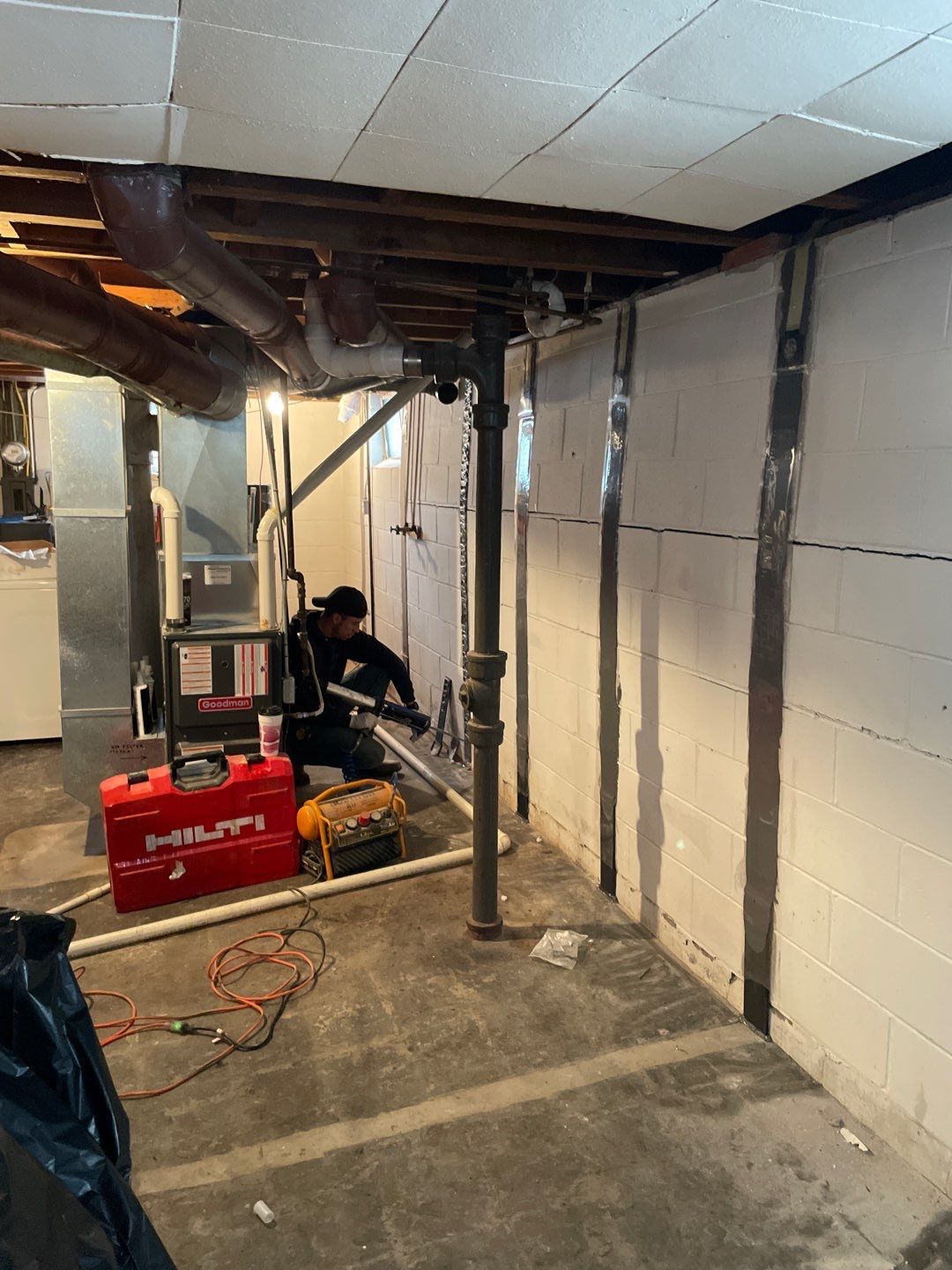 Bowing wall repair with Fortress Invisibeams by ACE Waterproofing & Basement Solutions