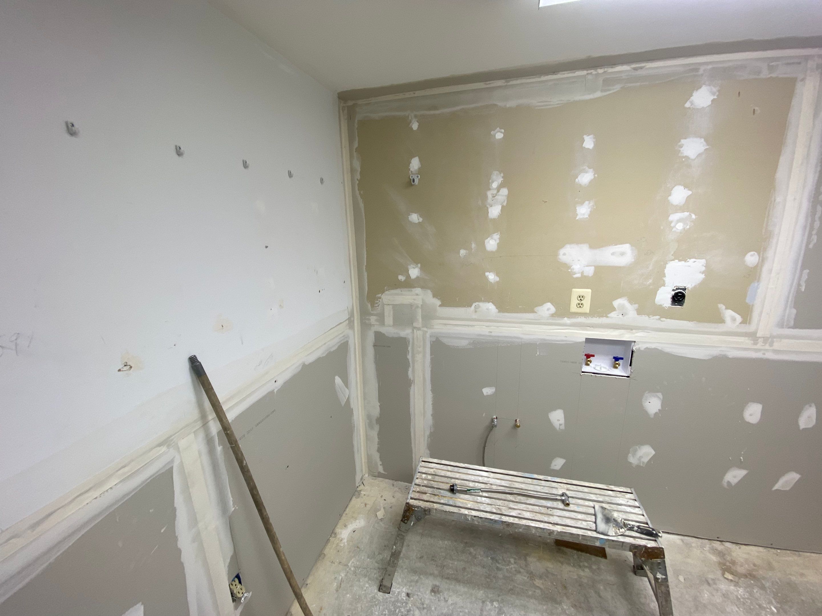 Laundry Room Redmodel using Lifeproof Luxury Vinyl Plank Flooring by The Smet Companies, LLC