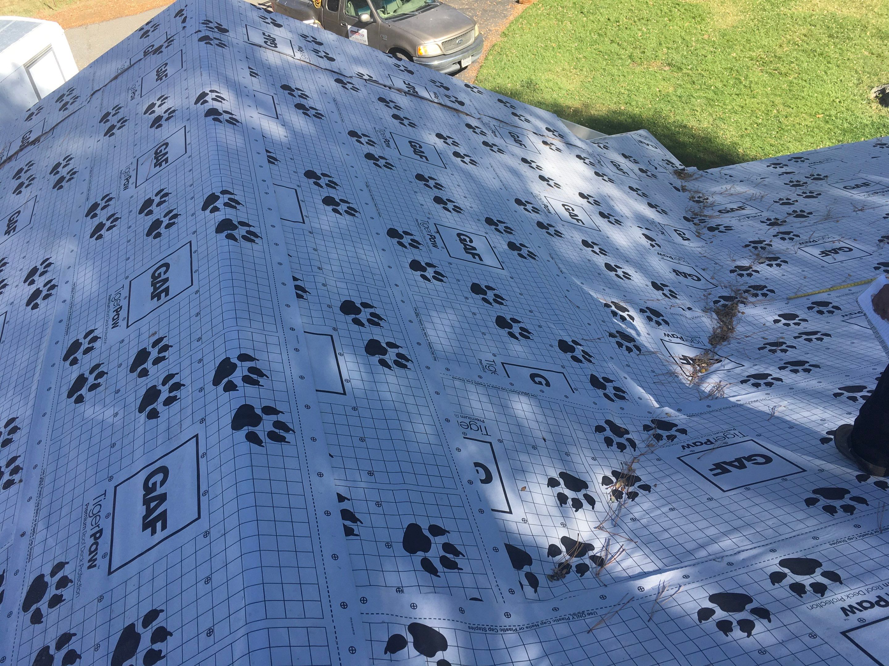Metal roofing installation using Standing seam metal roofing system by Straight Edge Roofing Inc