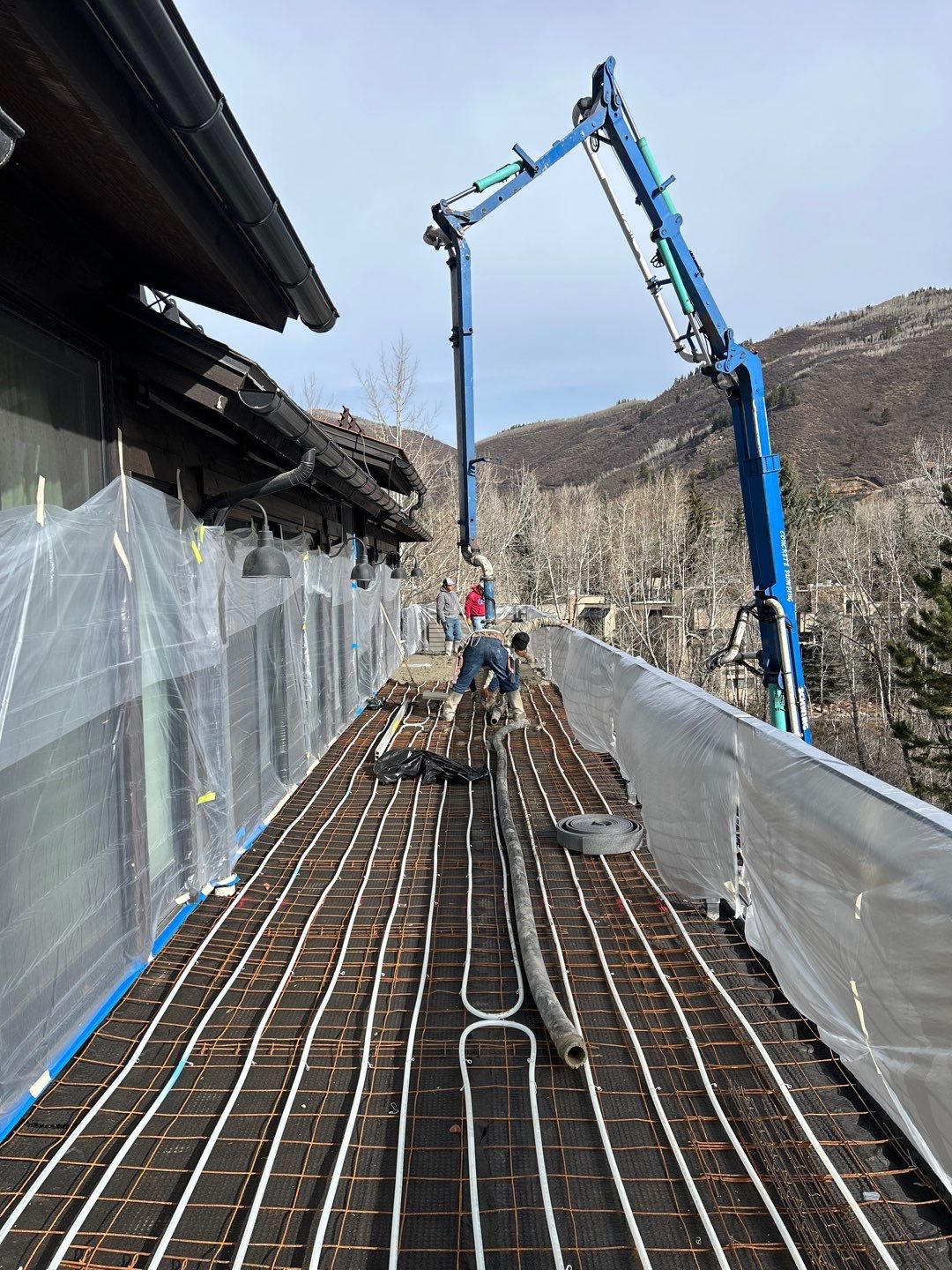 Deck repair & complex lighting install in Aspen by Roaring Fork Property Group 