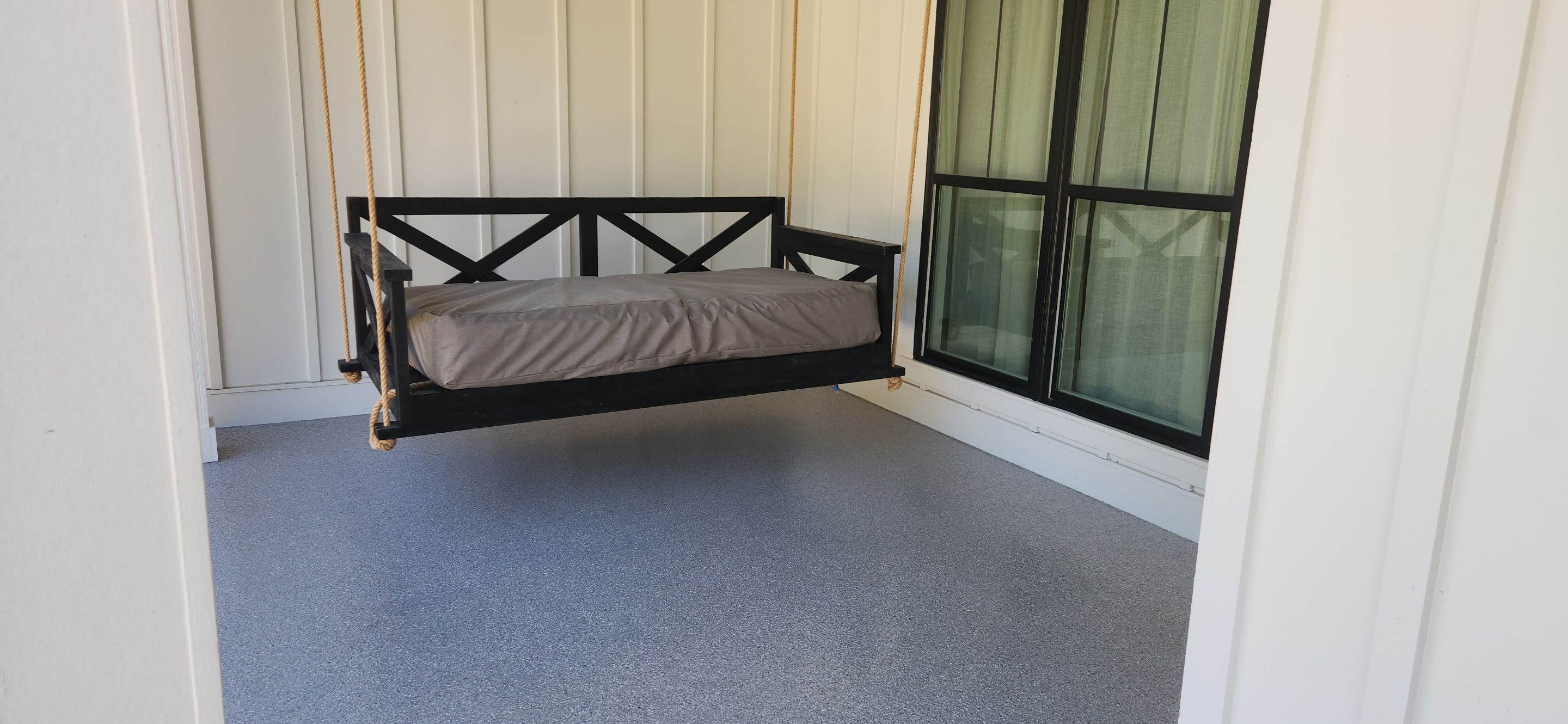 Front Porch and Garage using Coyote & Pumice by Elite Floor Solutions