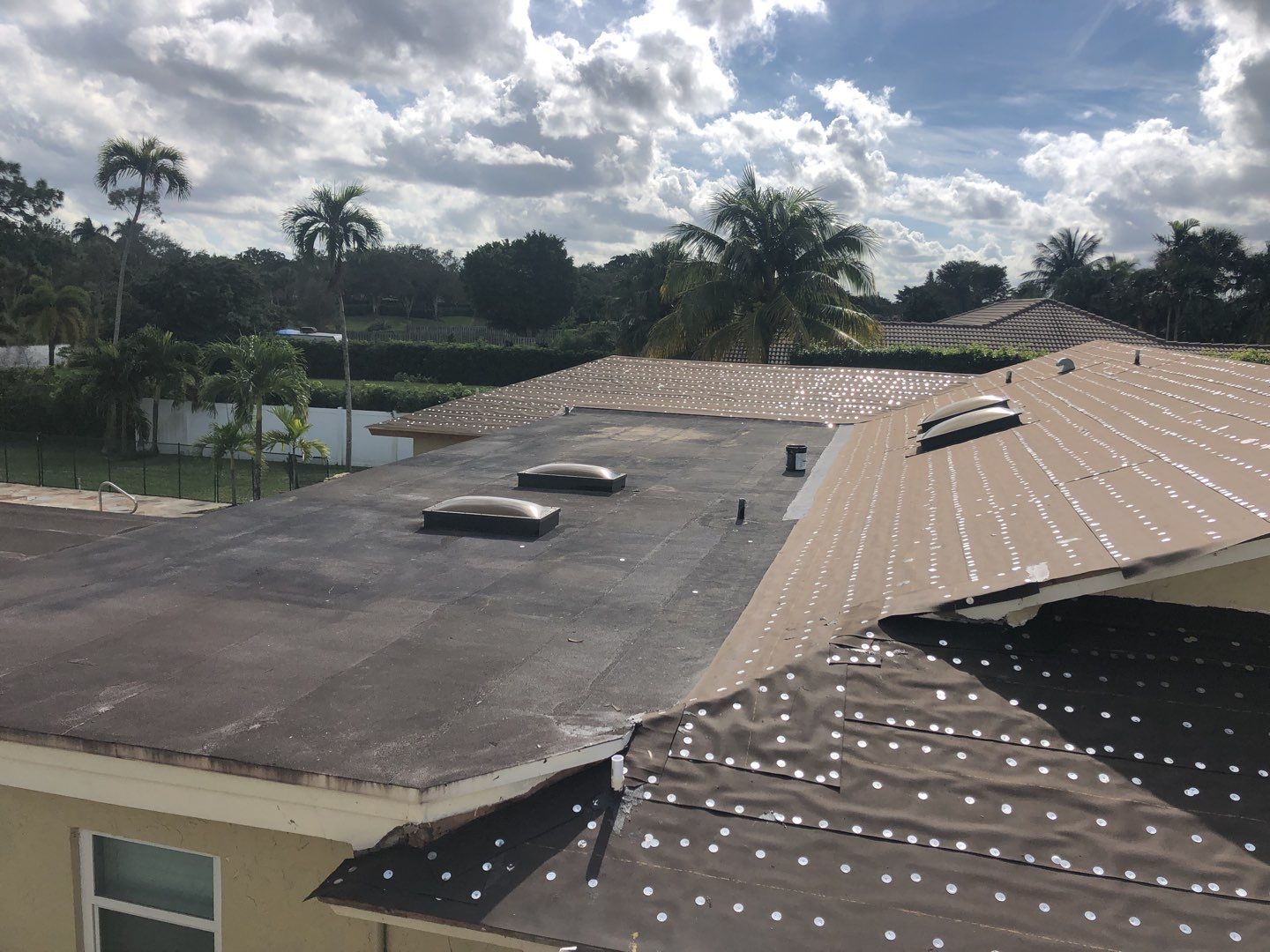 Residential Roofing Installation using 1" Nail strip metal roof by BLUES BROTHERS ROOFING