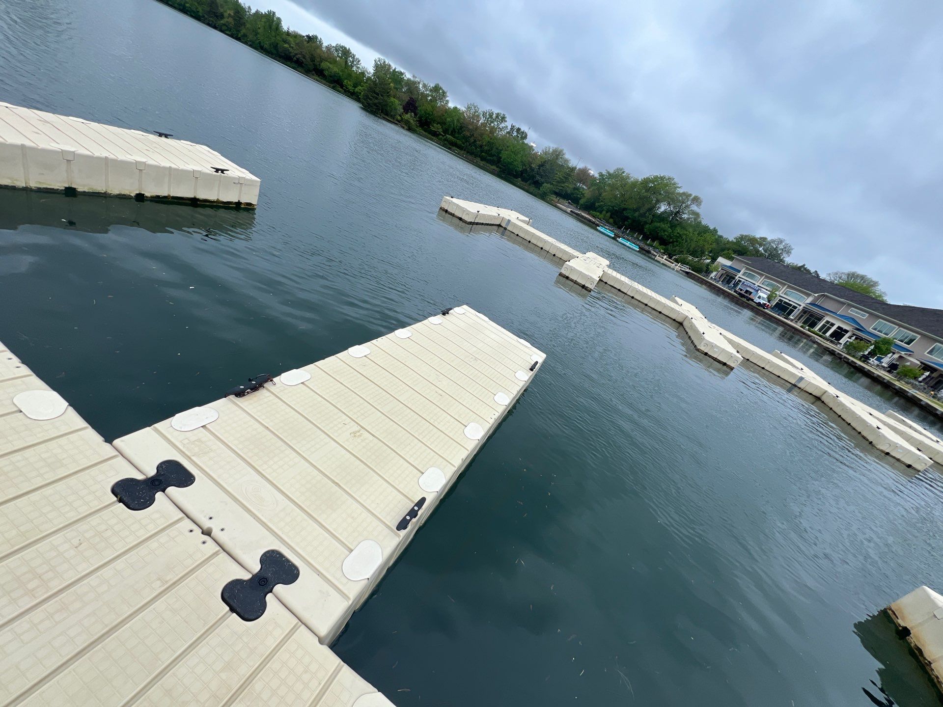 Power washing of floating dock by Northern Power Washing LLC.