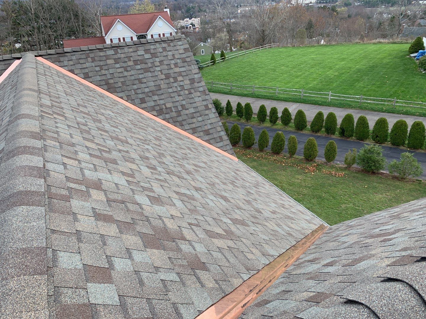 Commercial Roofing Installation using Owens Corning TruDefinition driftwood by A Plus Exterior