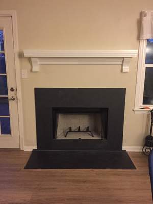 Wood Fireplace + slate + mantel