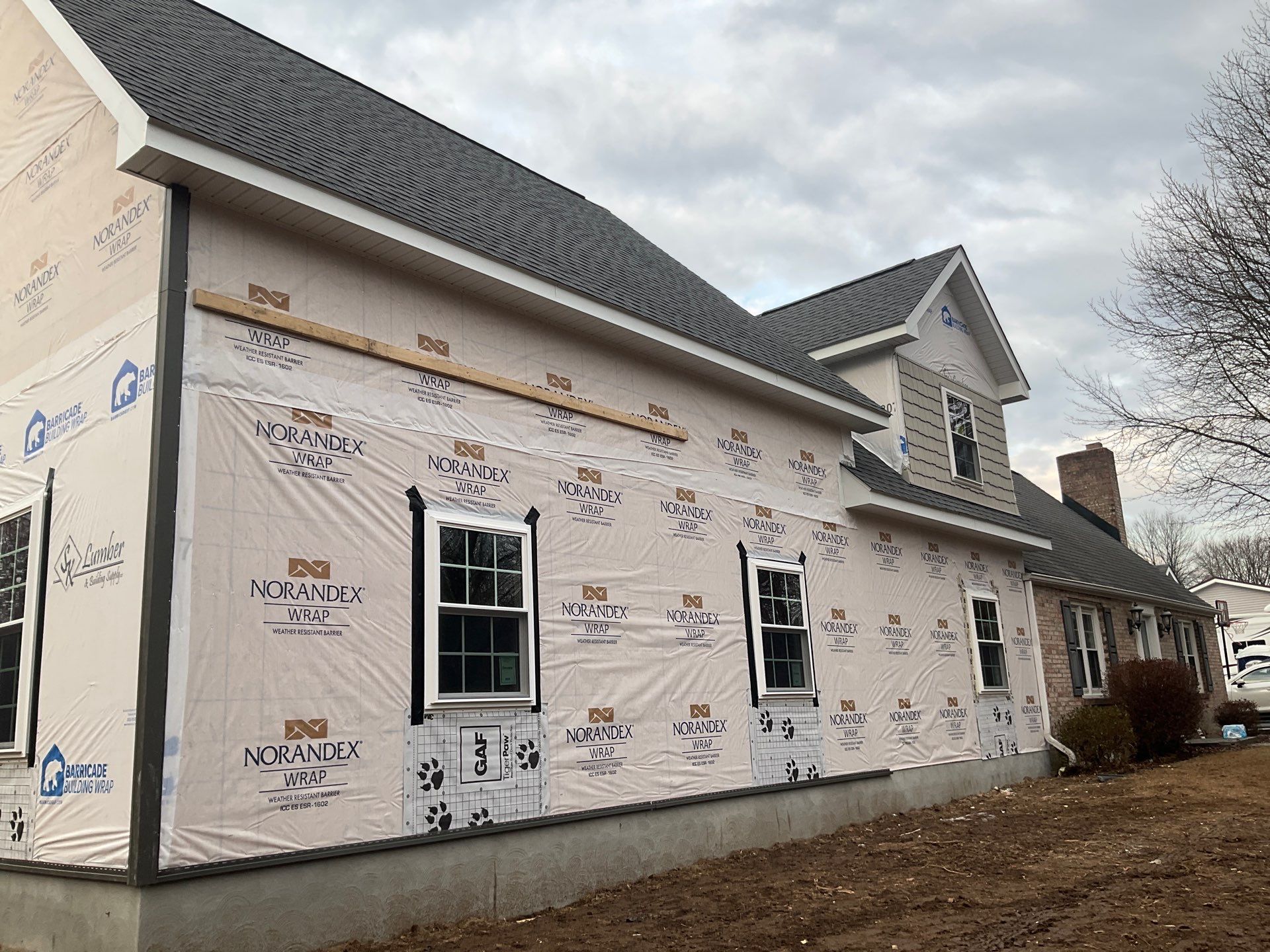 From Dormer to Full Gable Addition with Cathedral Ceiling by Esh Builders