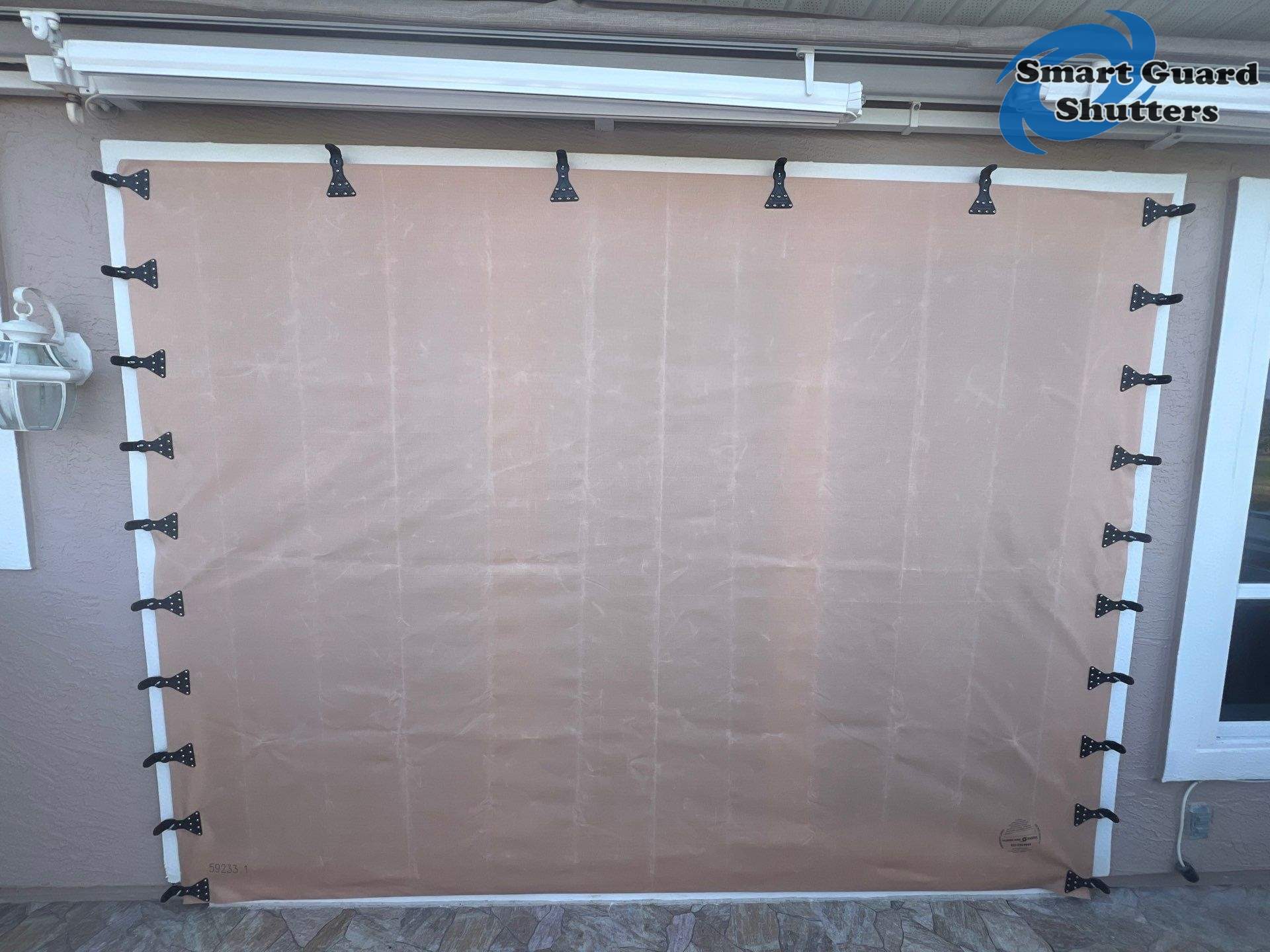 Hurricane Fabric in Tan by Smart Guard Shutters