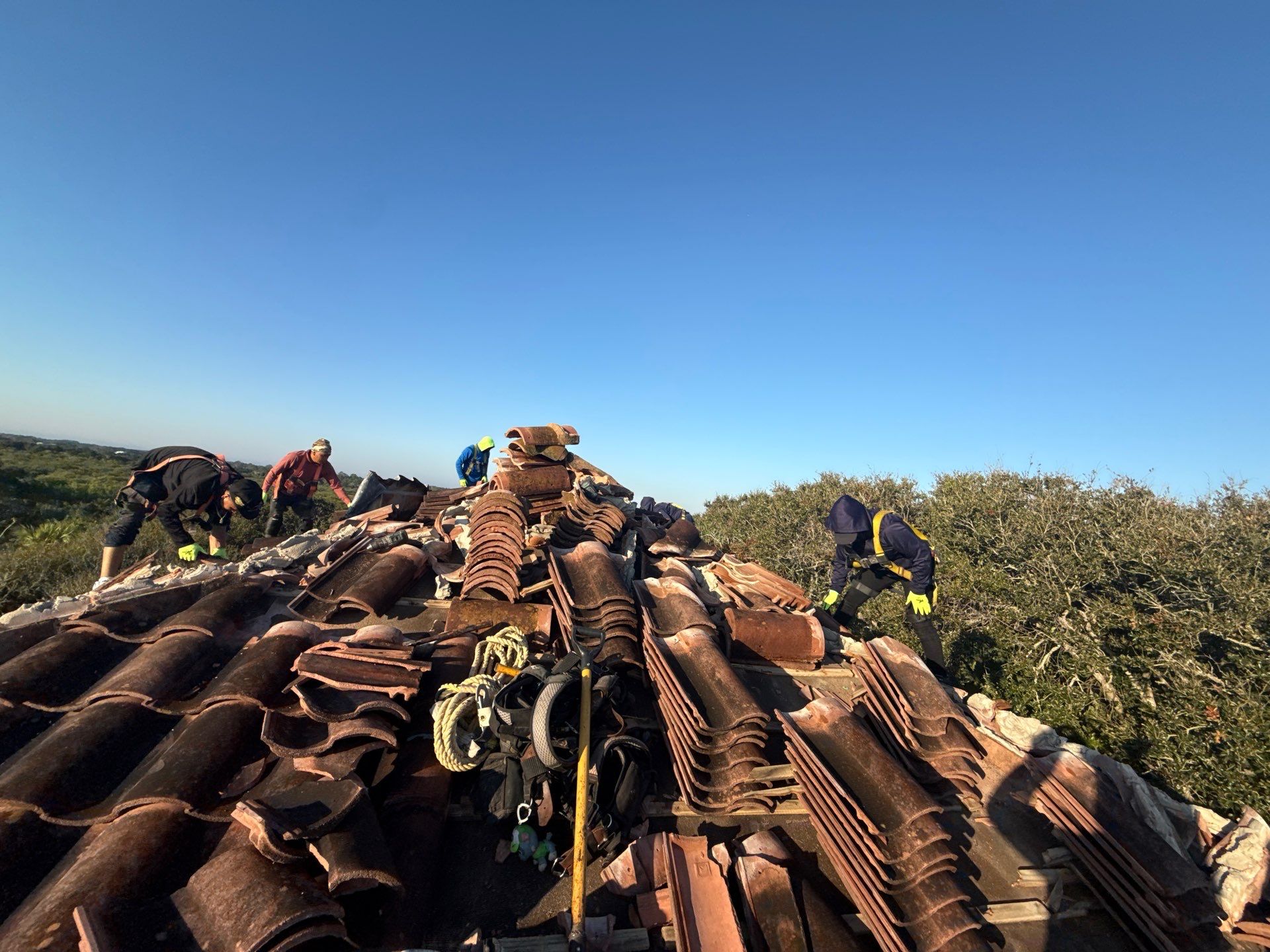Flagler Beach Residential Tile Roof Replacement with Dark Barrel Tiles by Fortified Roofing Solutions Corp.