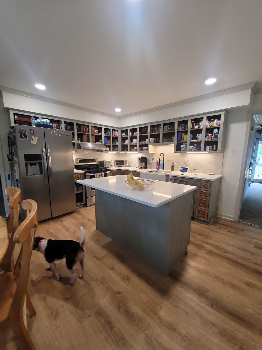 A Pathway to Personality – A Two-Tone Kitchen Transformation in Apex by Elite Remodeling and Design LLC