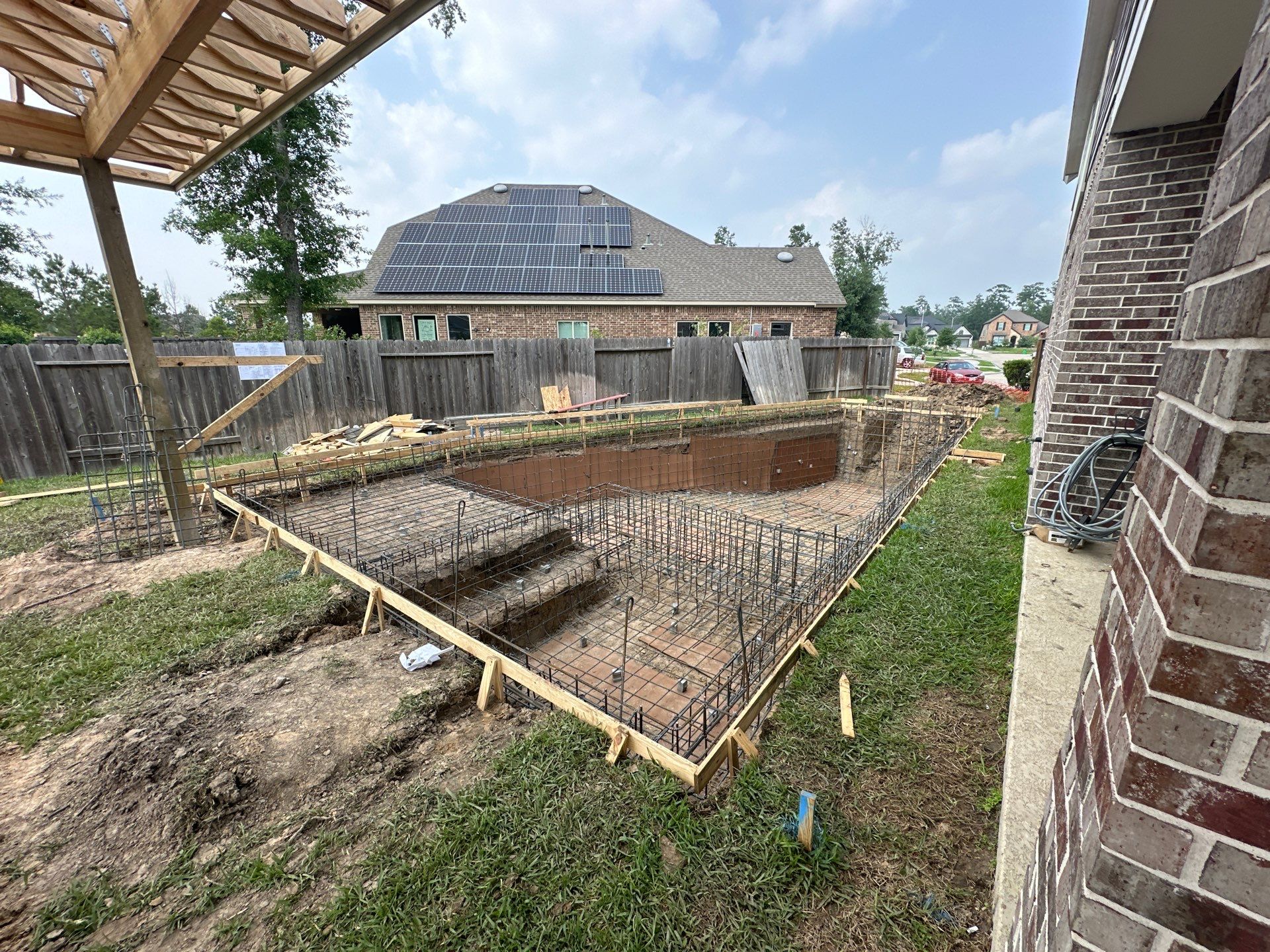 Covered patio and Summer Kitchen in Spring, TX by SophAlx LLC