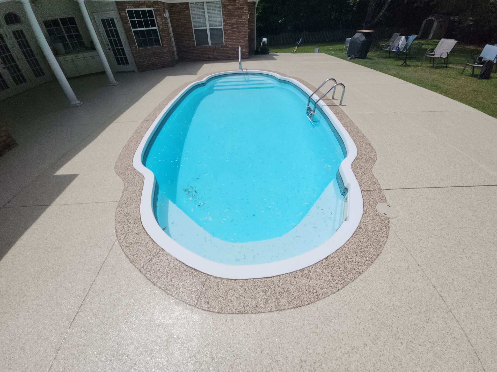 Simply Stunning: Mr. Richards' Gorgeous Custom Pool Deck by Deese Elite Concrete Coatings