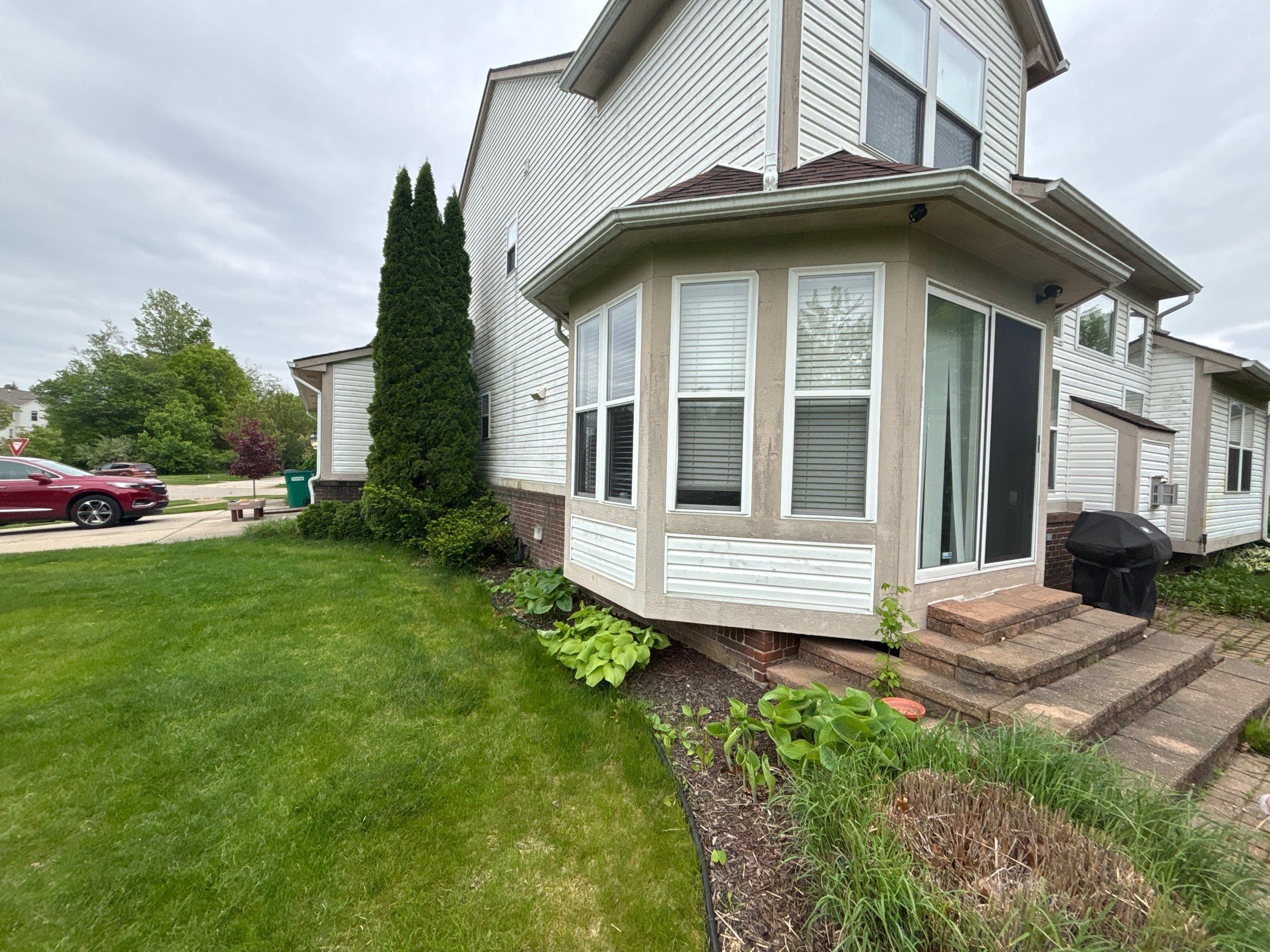 Siding Replacement using Alside D4 Odyssey-Plus Dutchlap Tuscan Clay by 180 Contractors