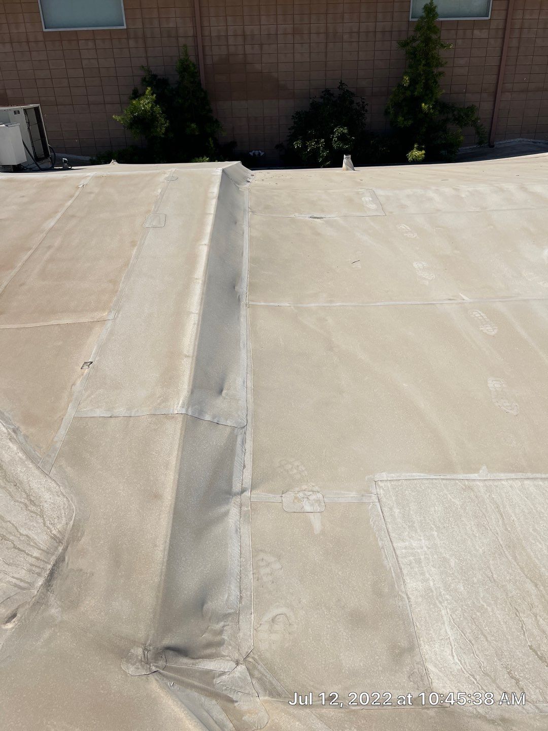 MR Roofing system using Benchmark/PUMA XL coatings over TPO single-ply roofing by Straight Edge Roofing Inc