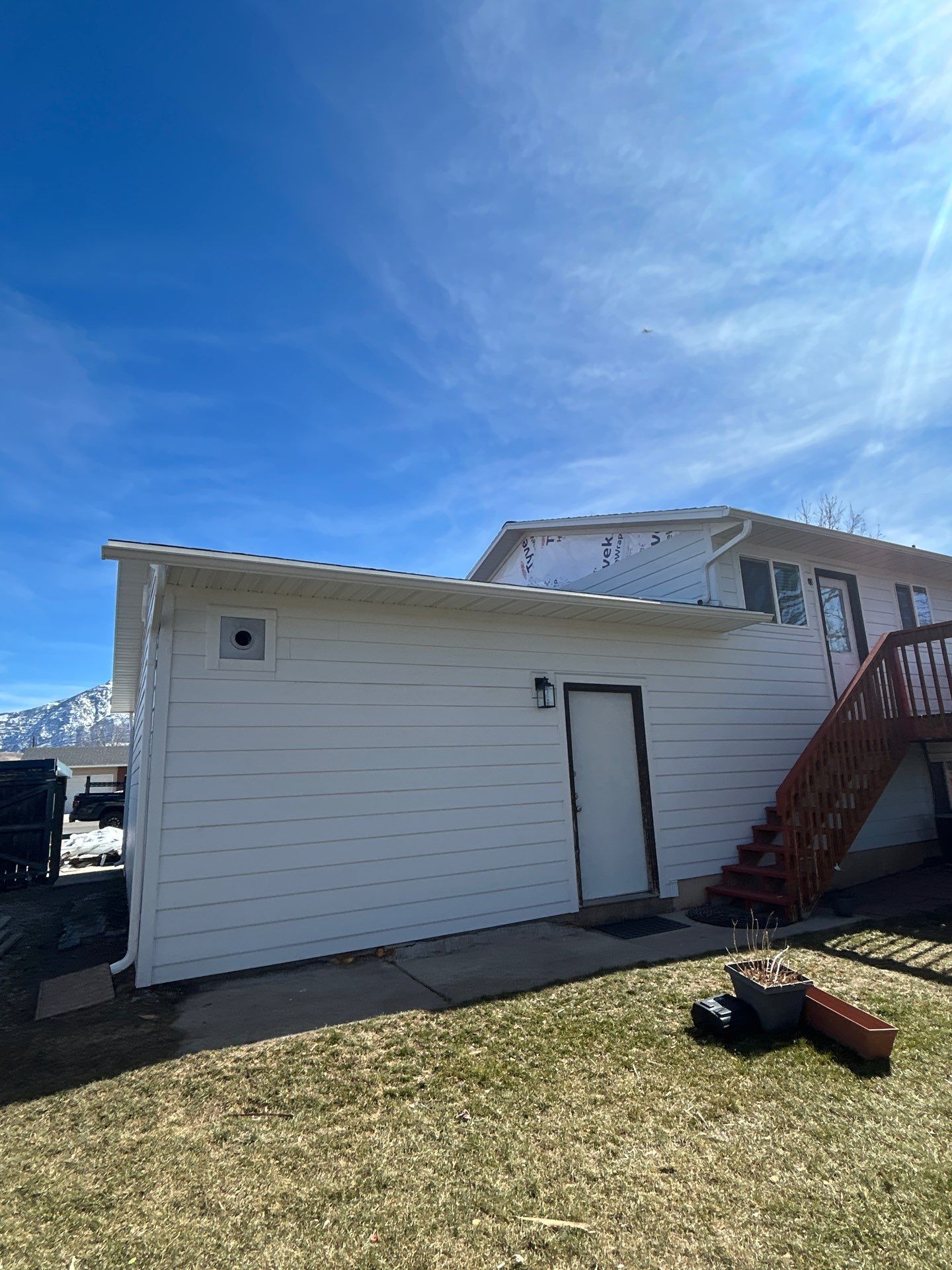 Orem | Crisp Monochromatic Hardie Upgrade | Arctic White by Ideal Siding Utah