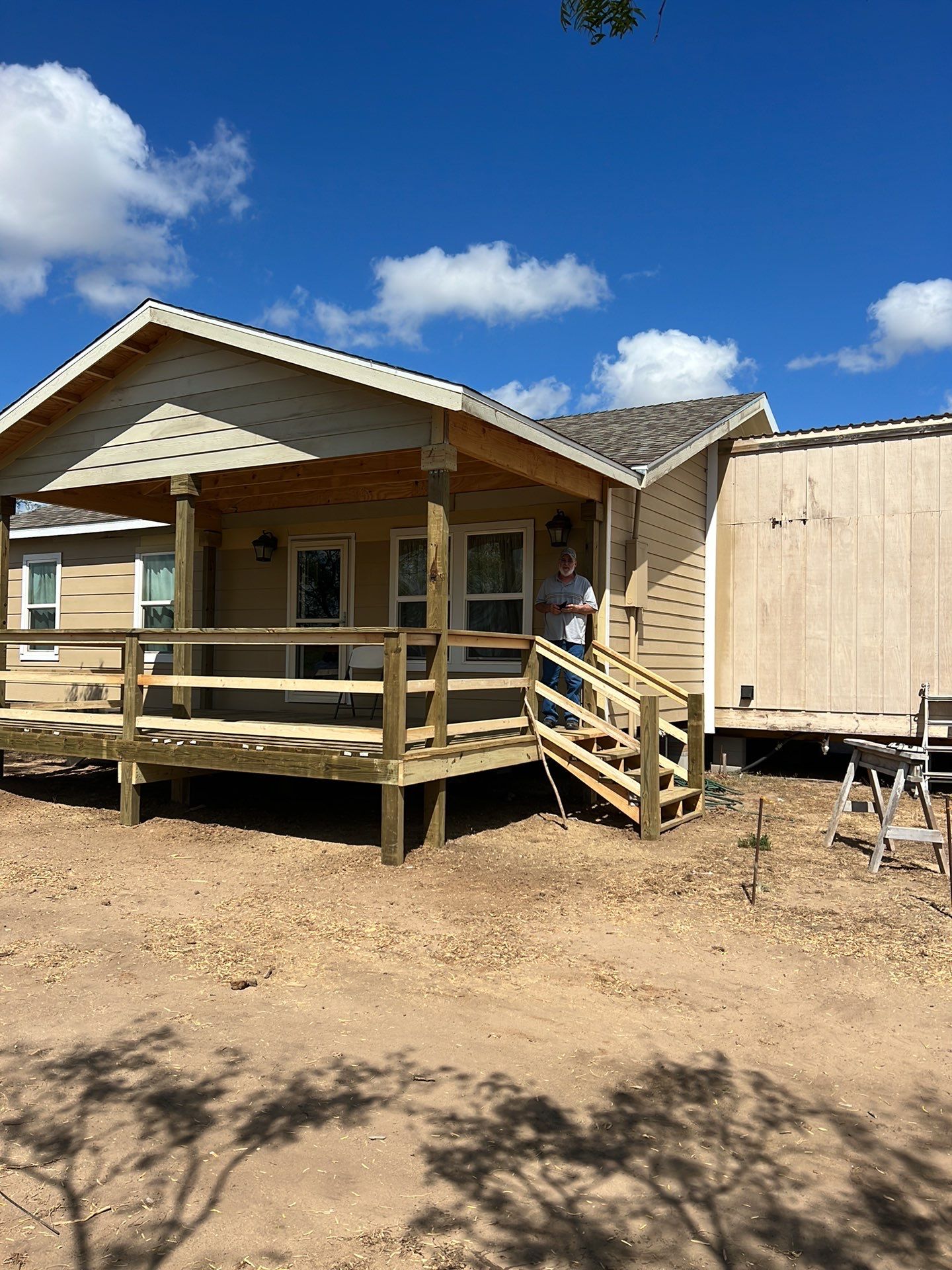 Front Porch Sitt'n by Bayfront Roofing and Construction