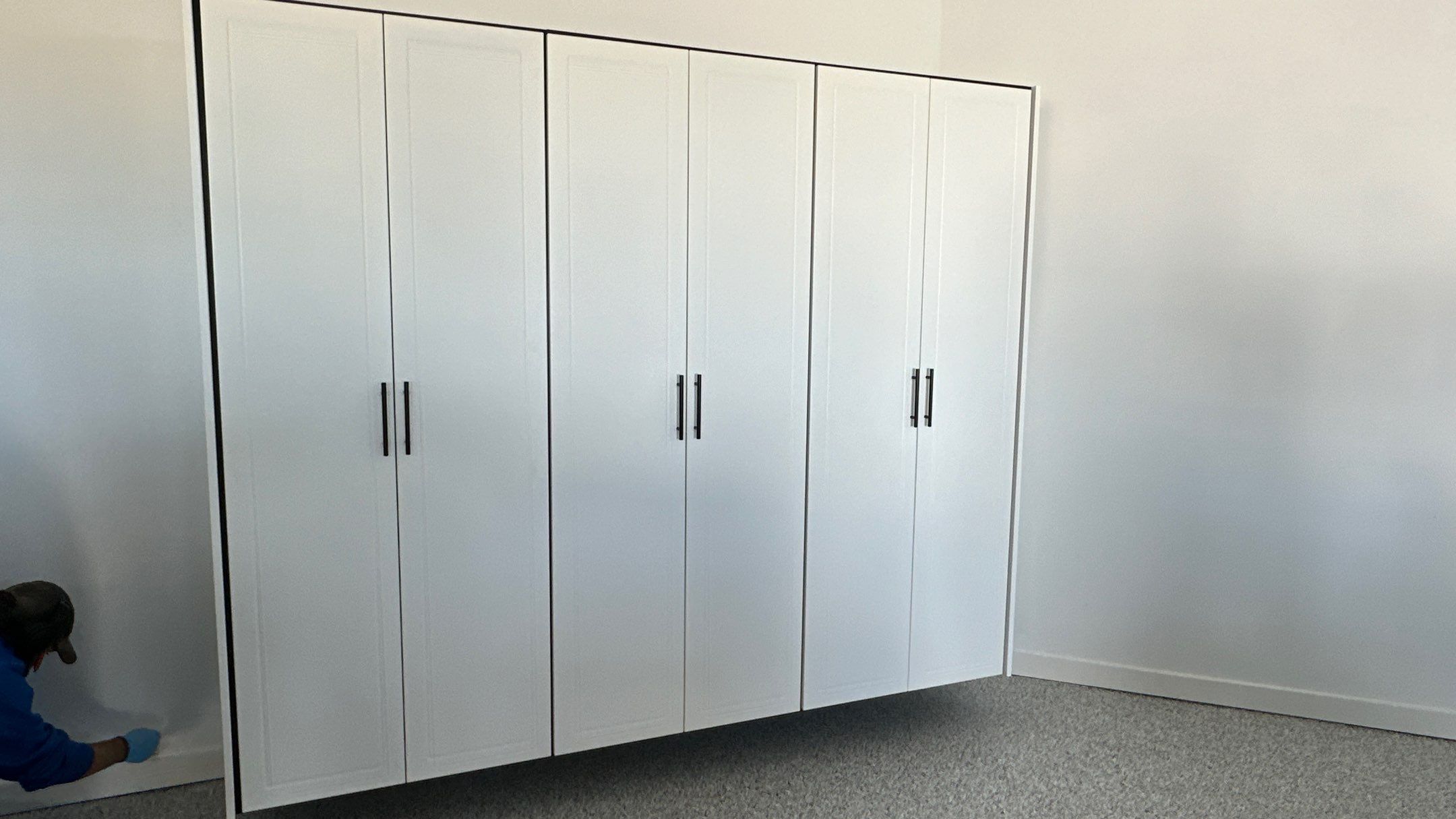 Jon S. transformed his garage with a new floor, slotwall & Cabinets!  by Banner Garage