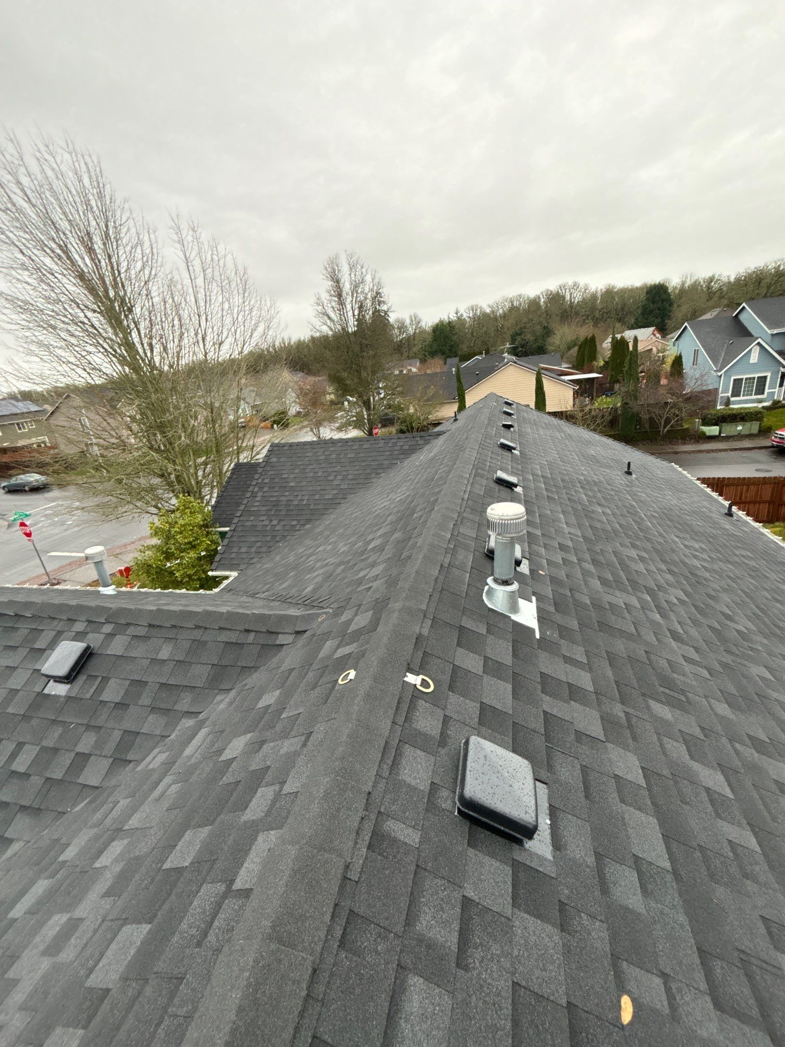 Residential Roofing Installation using IKO Dynasty (Color: Granite Black) by Orezona Building & Roofing Company, Inc.