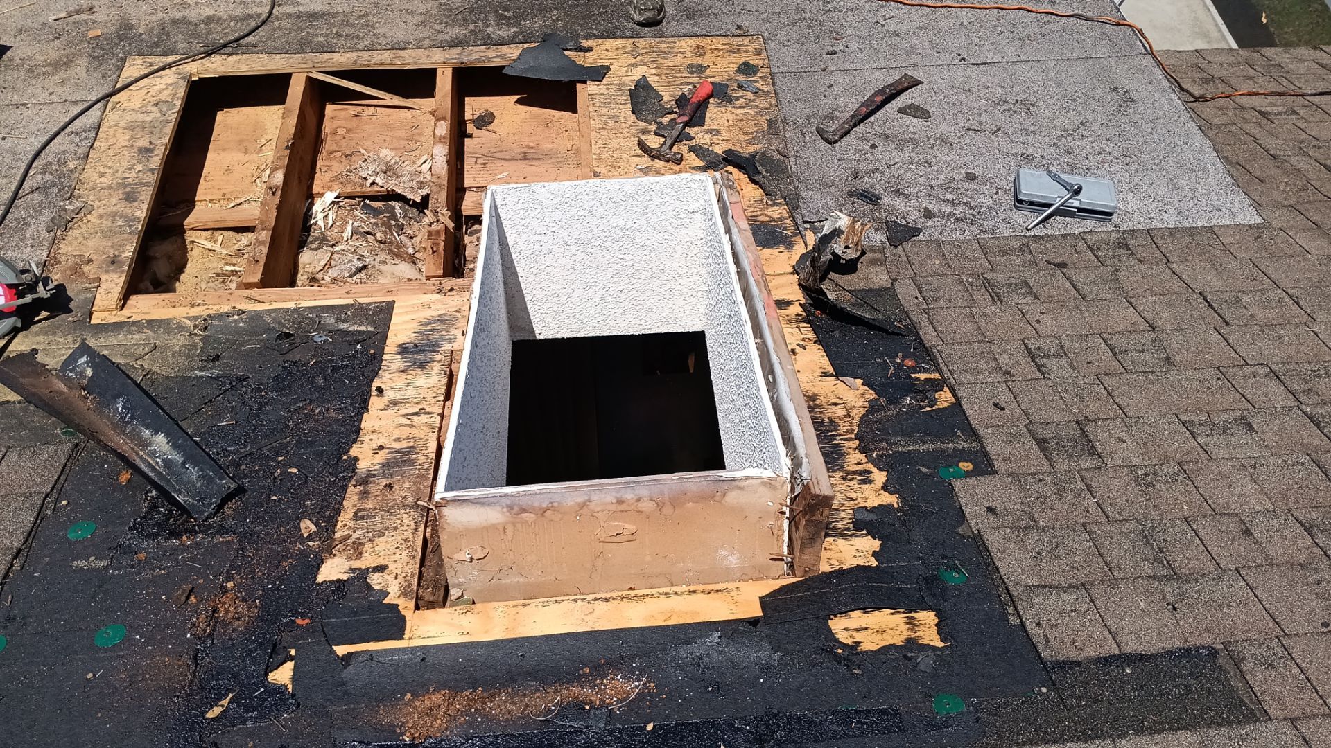 REPLACE NON APPROVED SKYLIGHT ALONG WITH CLOGED GUTTER by Morton Roofing, Inc.