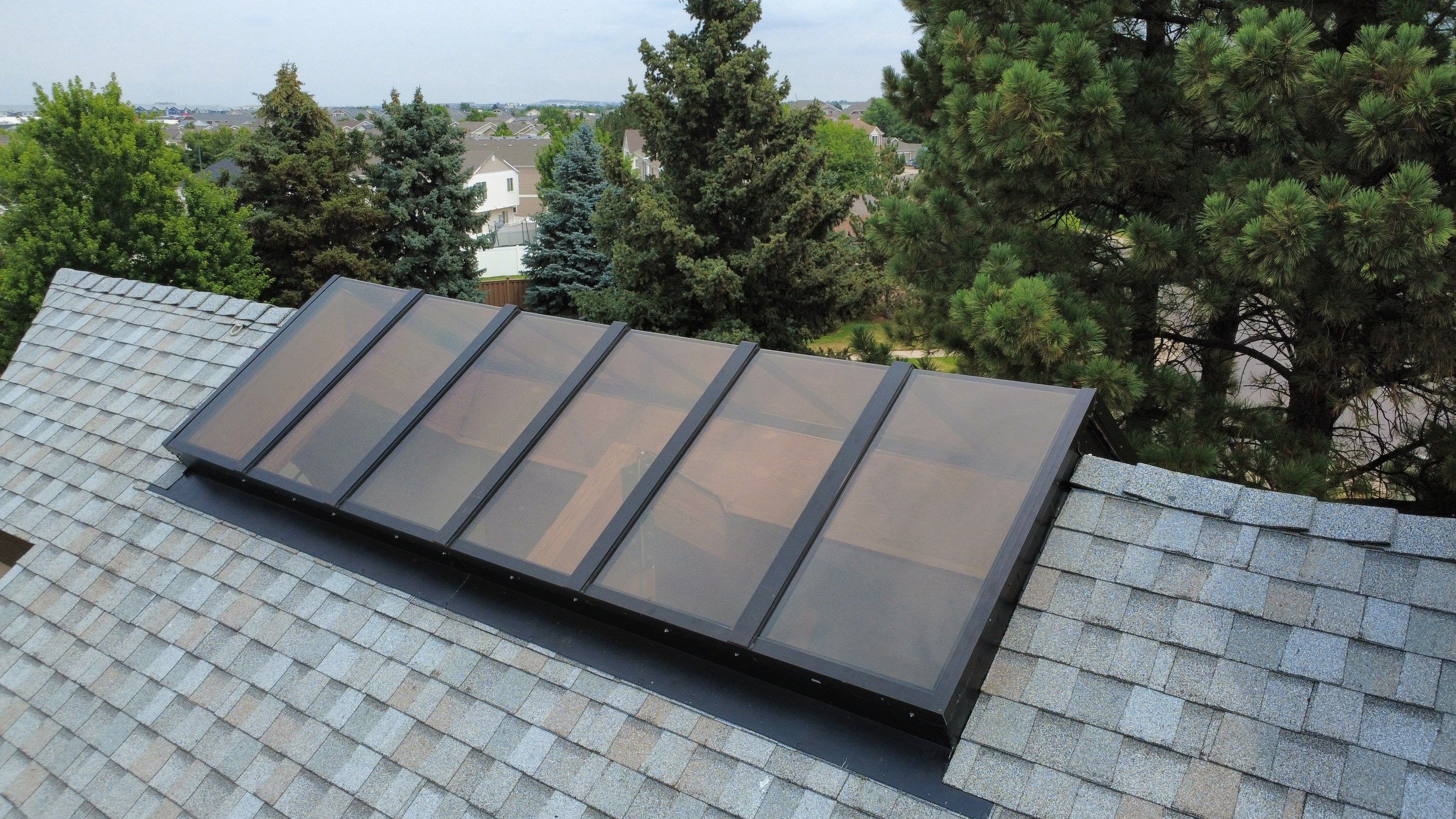 Asphalt Shingle and Skylight Replacement Project in Denver, CO by Blue Peaks Roofing LLC 