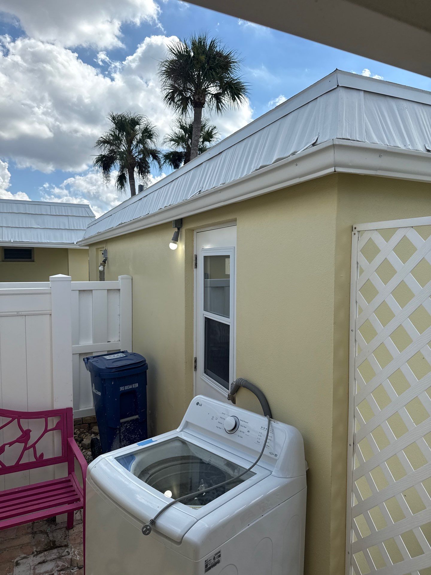 White Gutters and Matching Downspouts in Sarasota FL by Gutter Professors