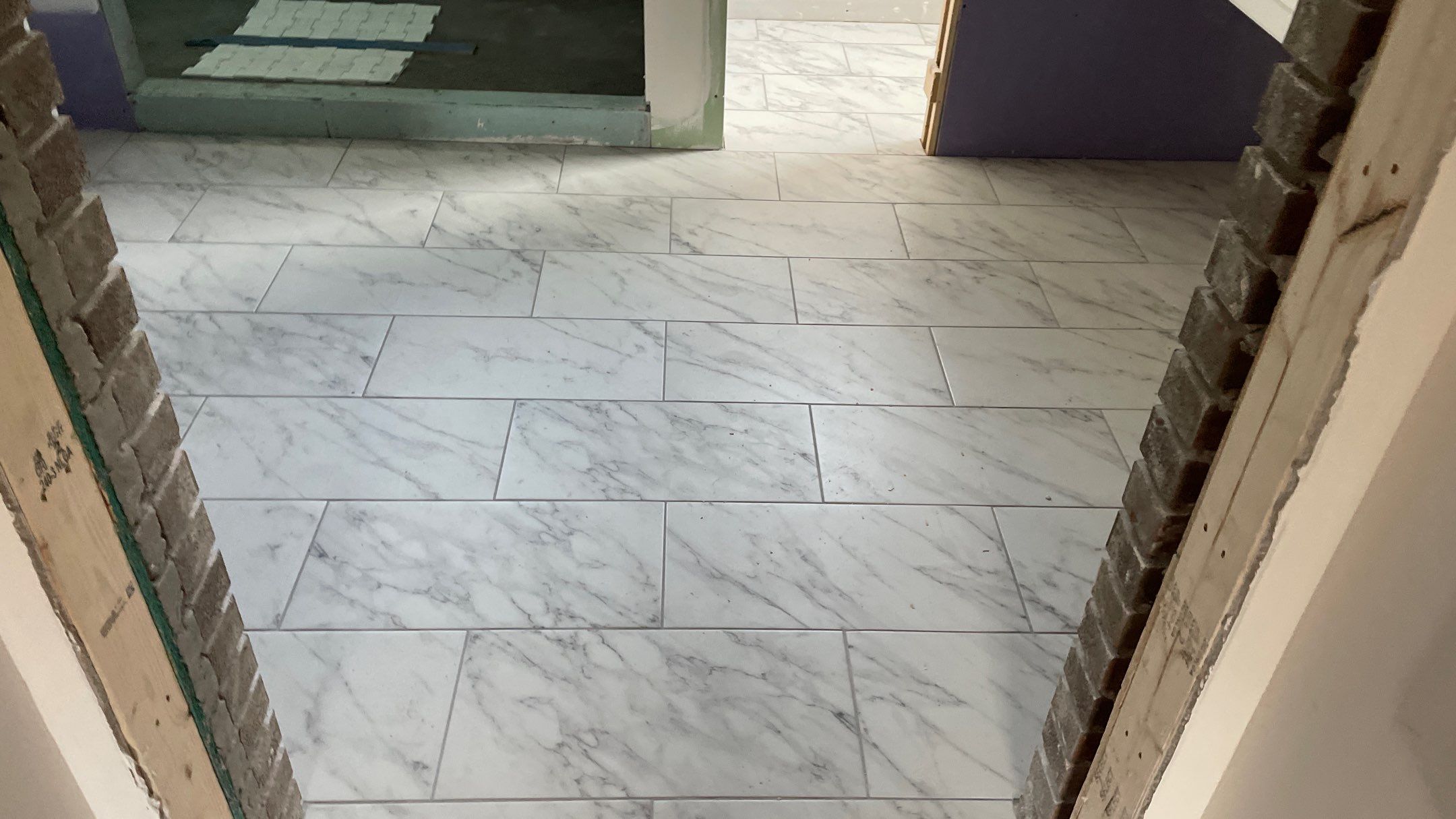 Remodeled Home with new tile floors, Showers and Refinished Oak Floors with stain and Waterbased Finish by Footprints Floors of Coastal Carolina