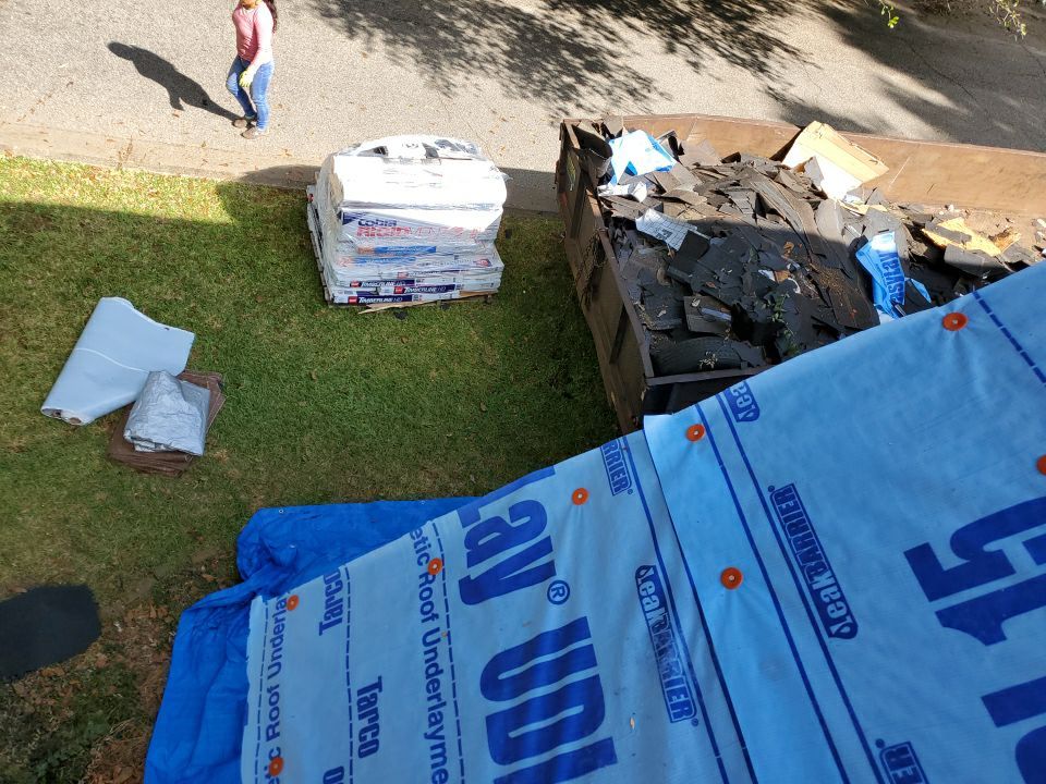 Residential Roofing Installation using Roof Replacement by American Roofing & Construction LLC