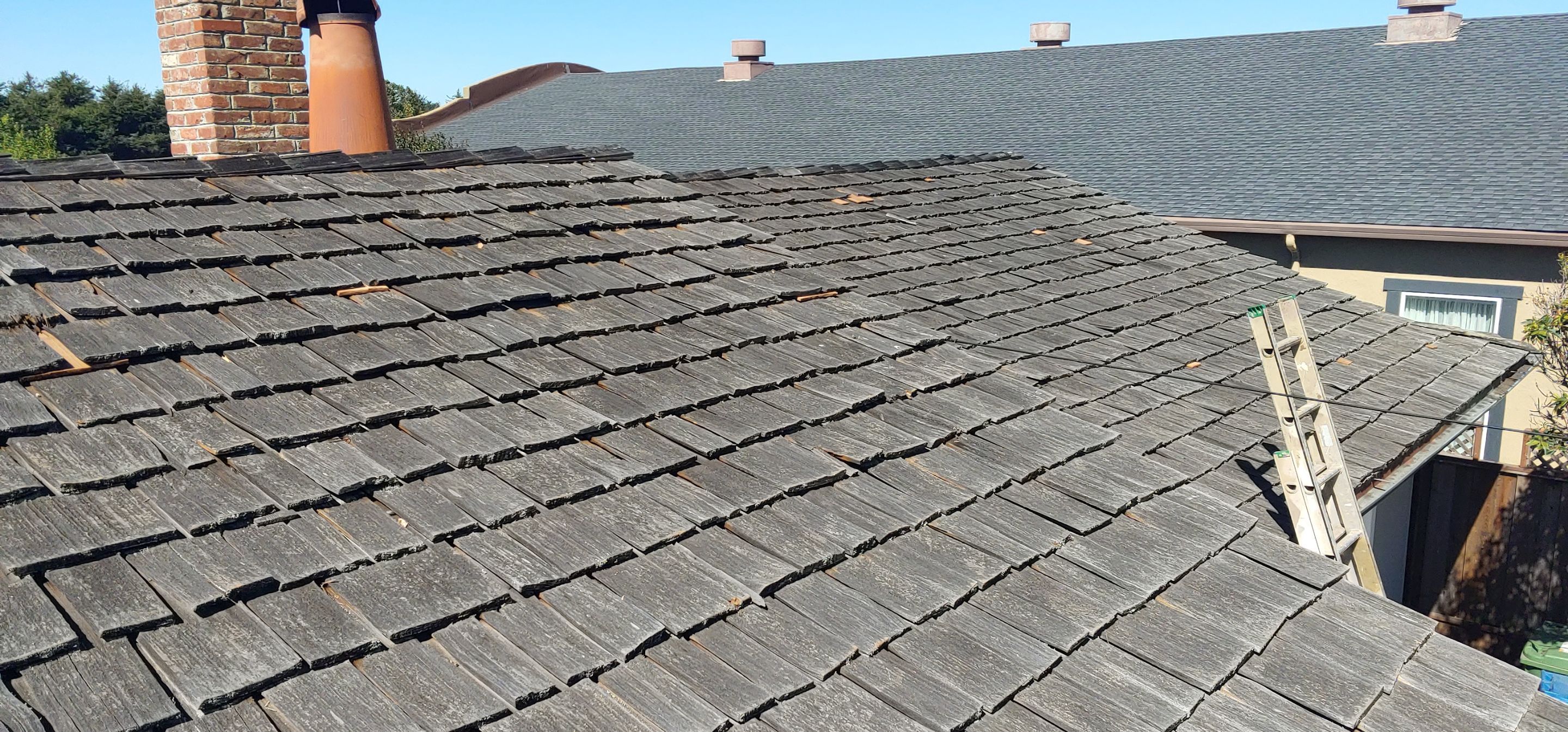 Refurbish and repair shake roof to get ready to sell by Straight Edge Roofing Inc