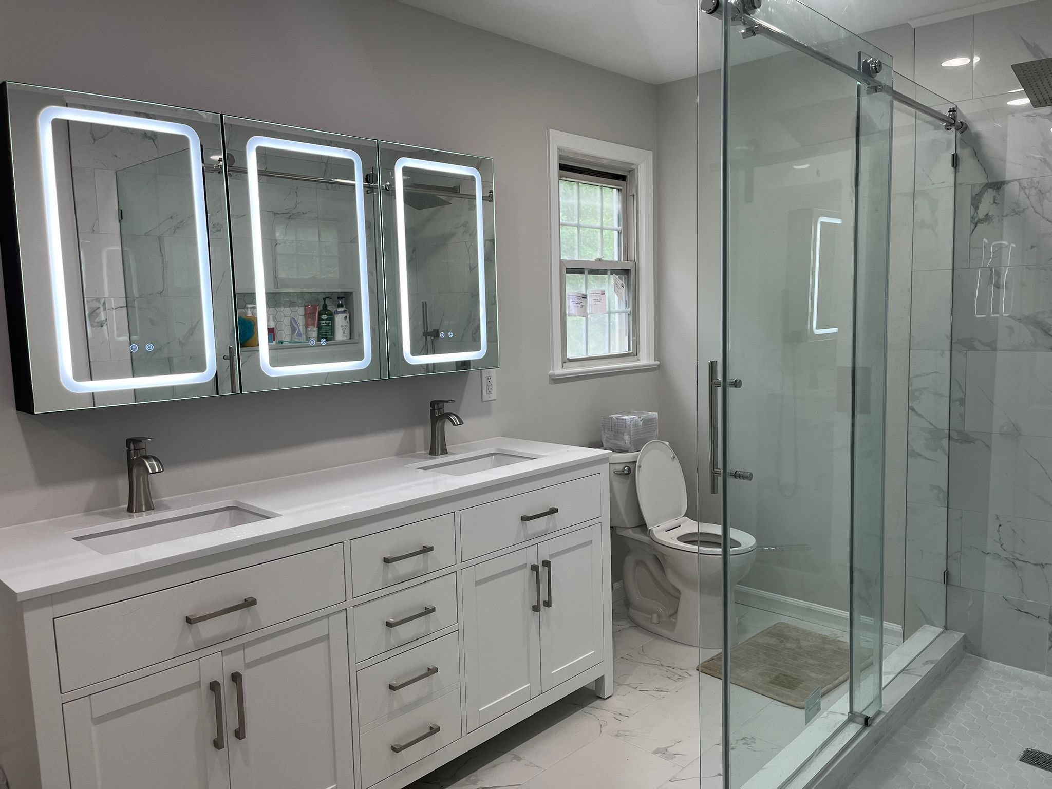 Bathroom Remodel using Tile by Home Concepts Construction