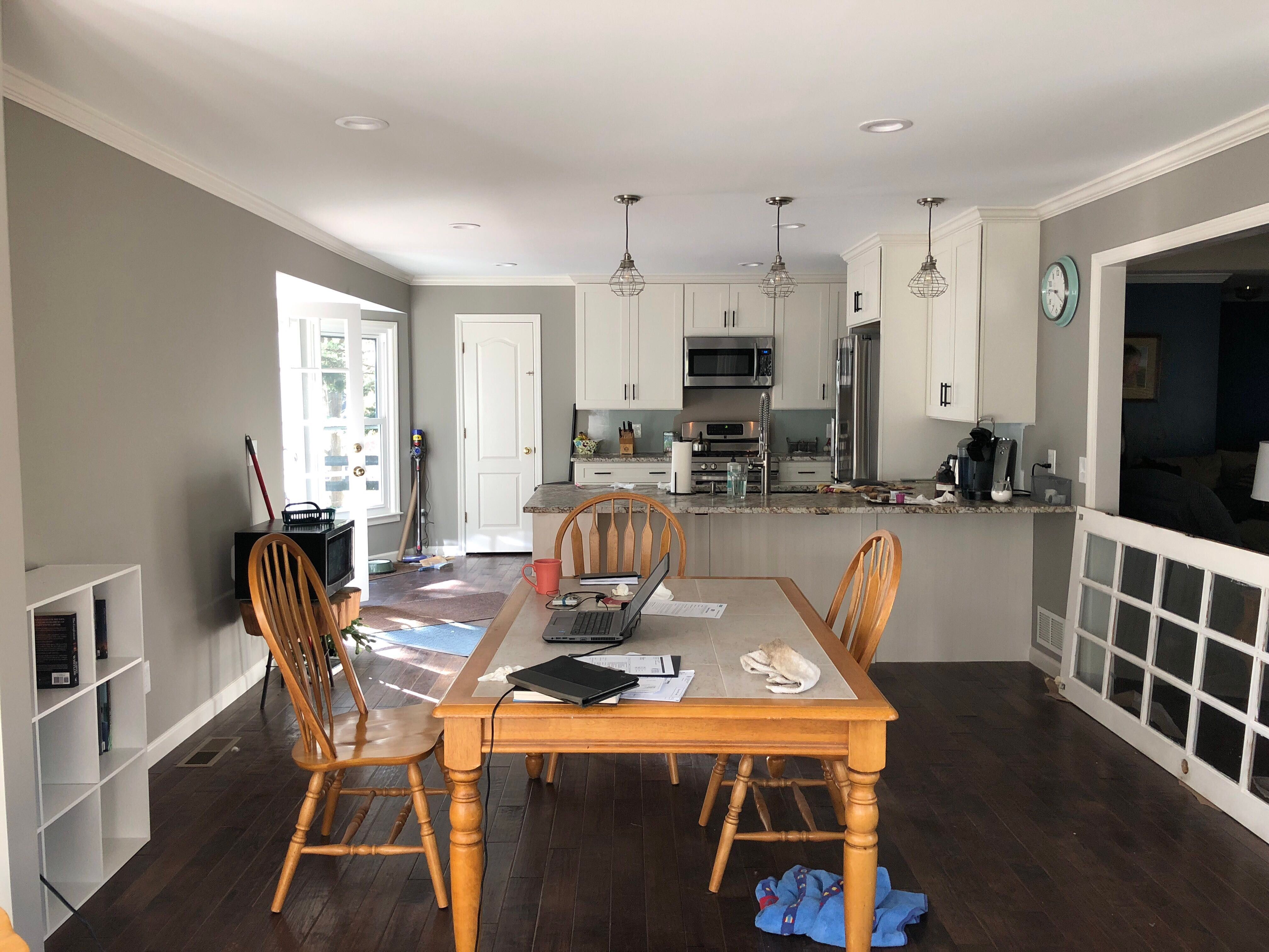 Open Concept Kitchen Remodel With White Shaker Cabinets in Kennesaw by Swift Home Renovations