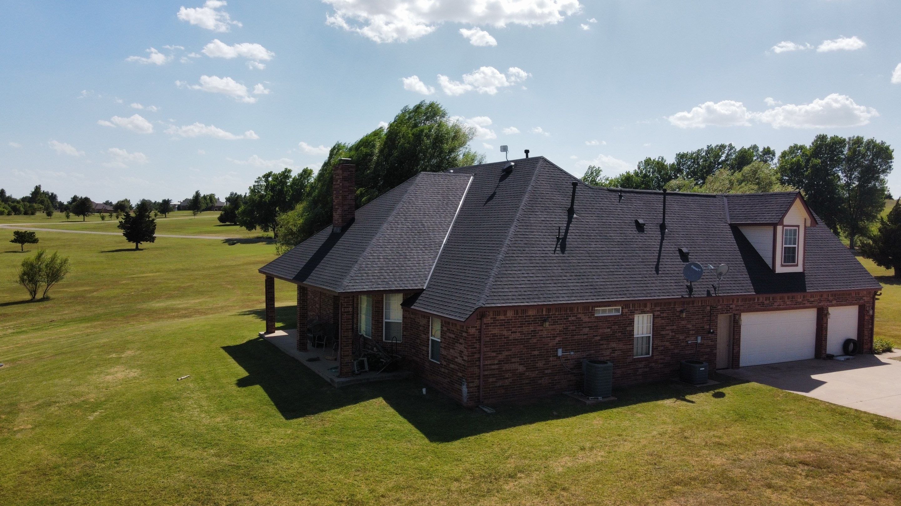 Residential Roofing Installation using GAF Natural Shadow  by A & H Roofing and Contracting