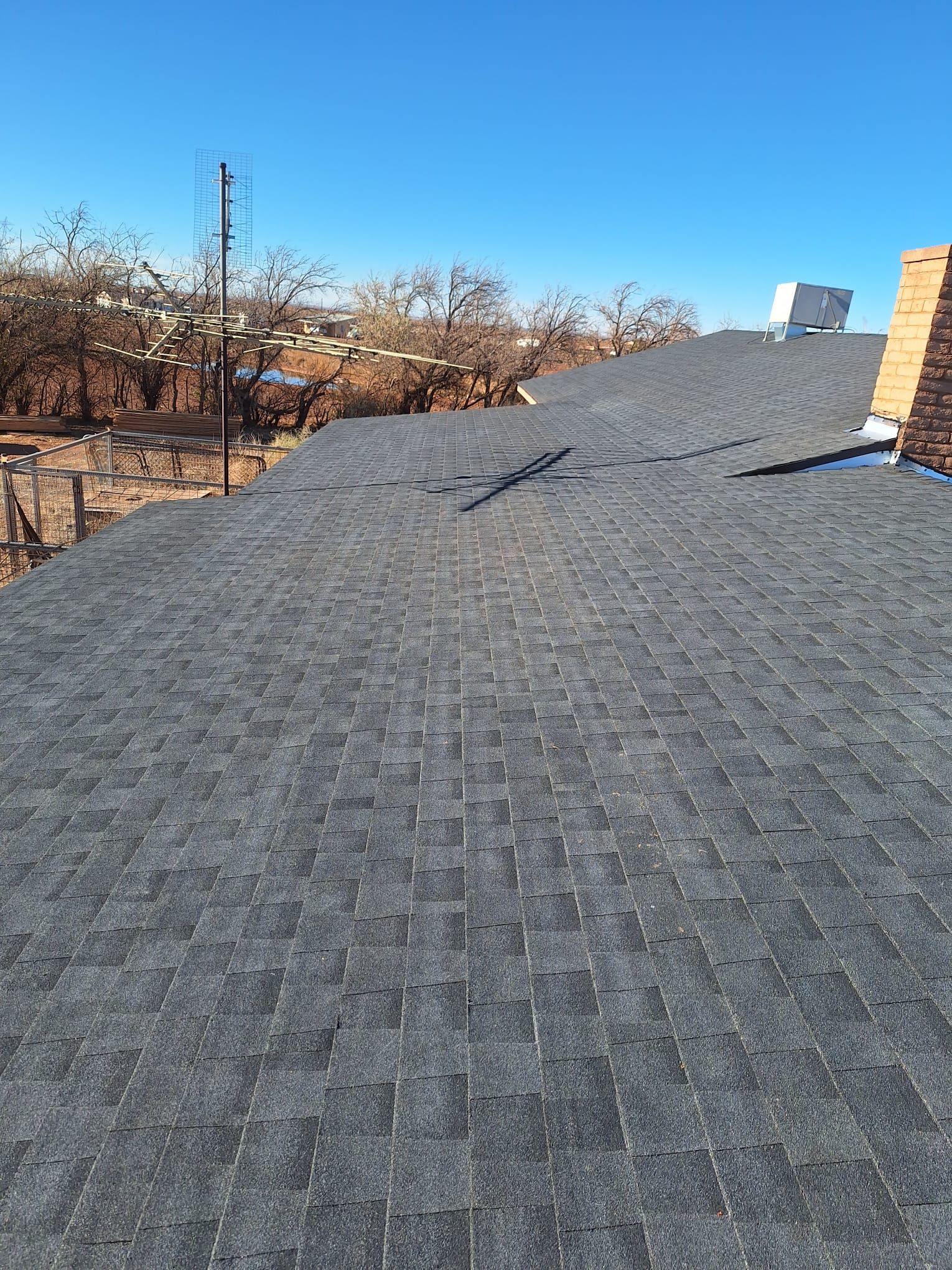 Estate Gray Shingles by Reimagine Roofing